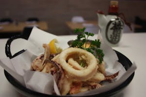 Order Black Squid food online from Kanbu Sushi Downtown store, Ann Arbor on bringmethat.com