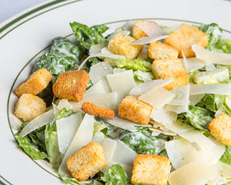 Order Caesar Salad food online from Beggars Pizza store, Richton Park on bringmethat.com