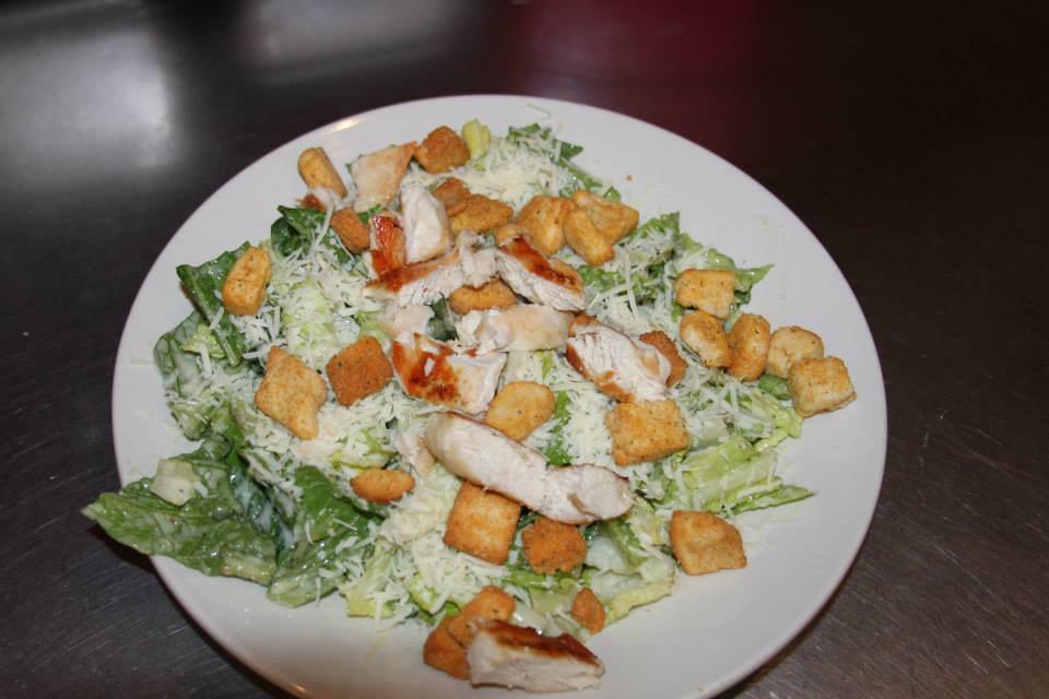Order Caesar Salad food online from Florencia Pizza store, Sun City West on bringmethat.com