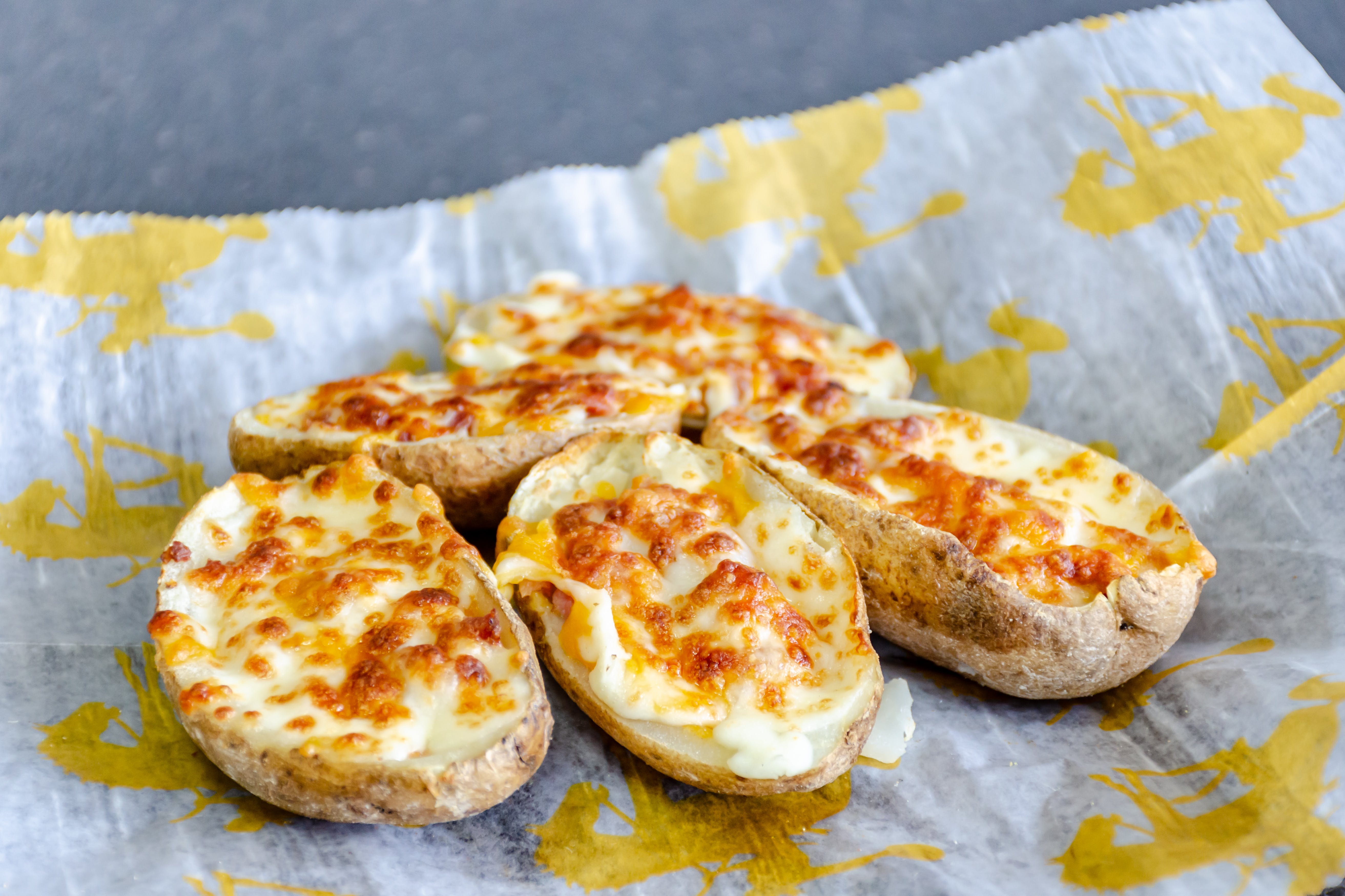 Order Potato Skins - Appetizer food online from Hometown Locker Room Pizza & Sub store, St Marys on bringmethat.com