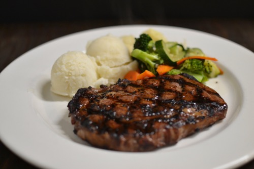 Order 14oz Ribeye with Veggies  food online from Chefs Of New York store, Modesto on bringmethat.com