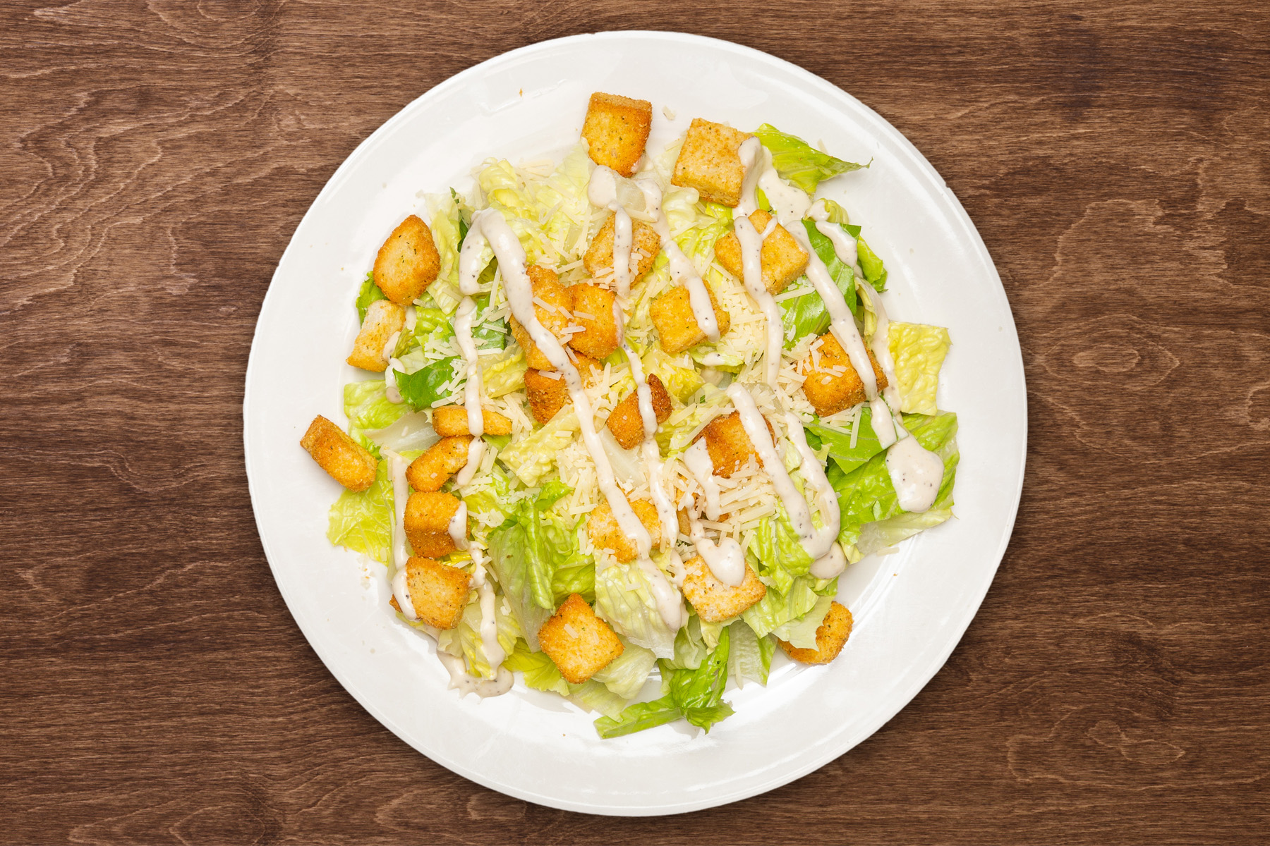 Order Caesar Salad food online from The Green Olive store, Santa Fe Springs on bringmethat.com