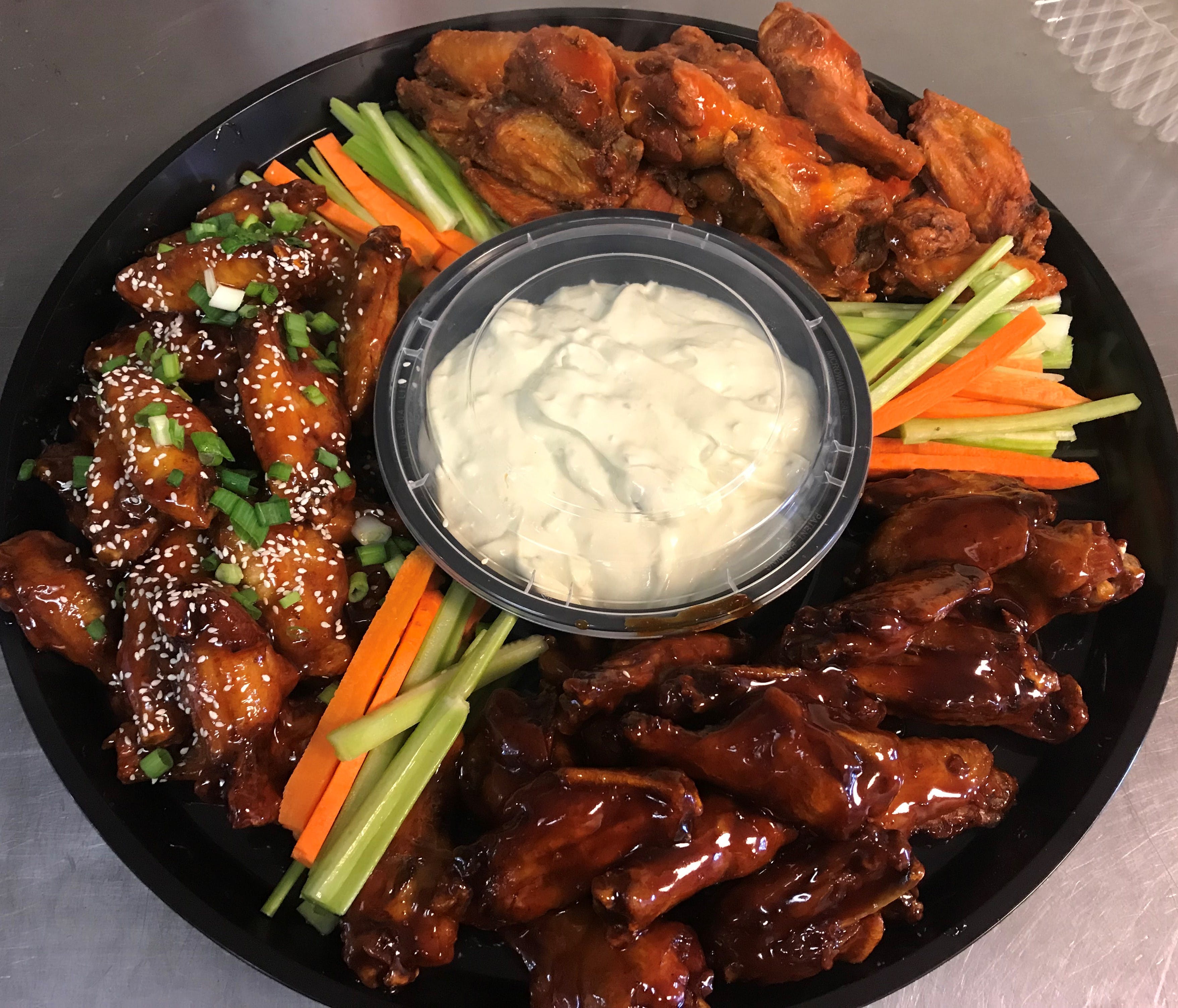 Order Wings Catering - 50 Pieces food online from Cosimos Pizza Cafe store, Philadelphia on bringmethat.com