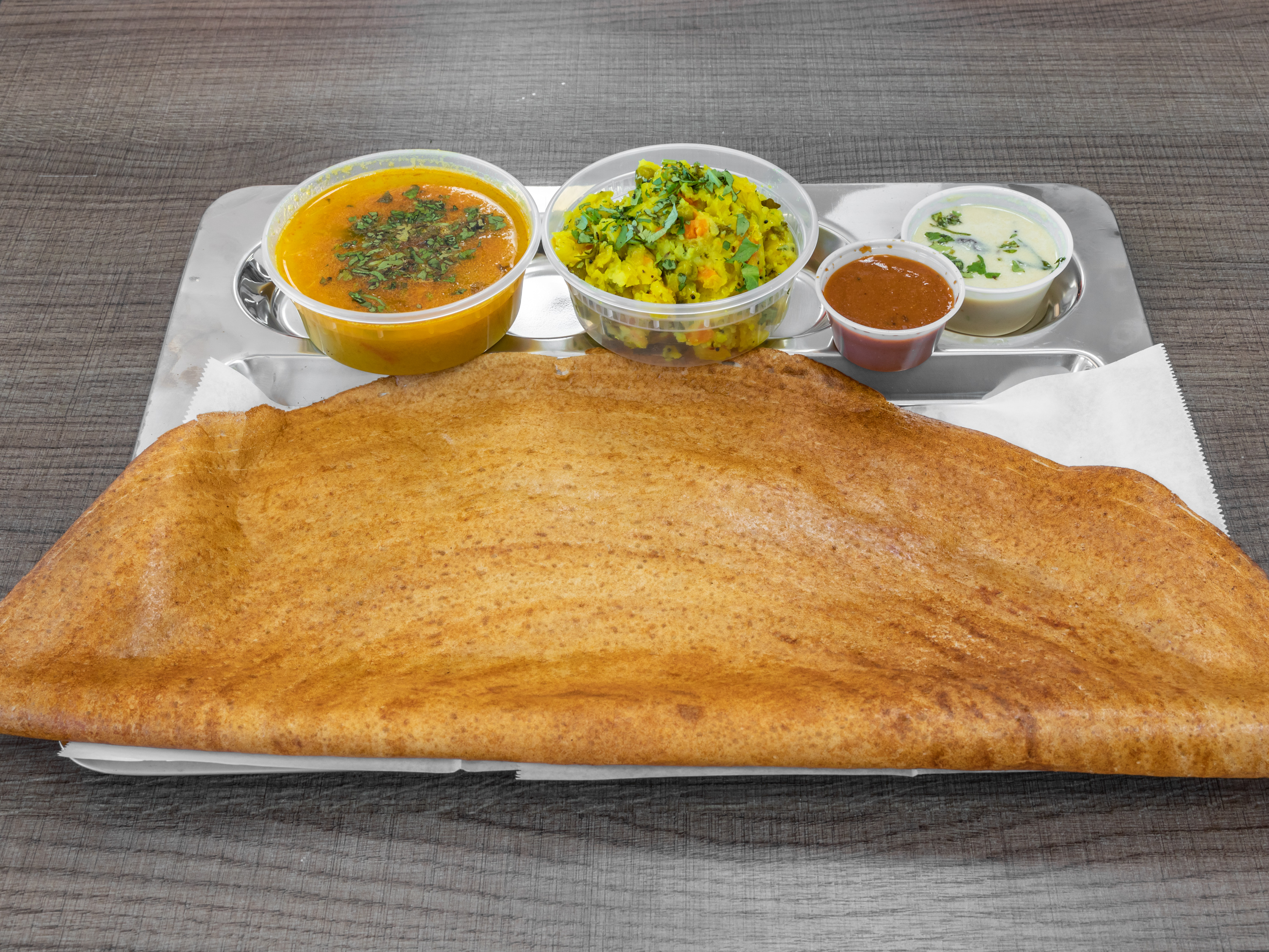 Order Masala Dosa food online from Saffron Indian Grocery N Kitchen store, Scottsdale on bringmethat.com