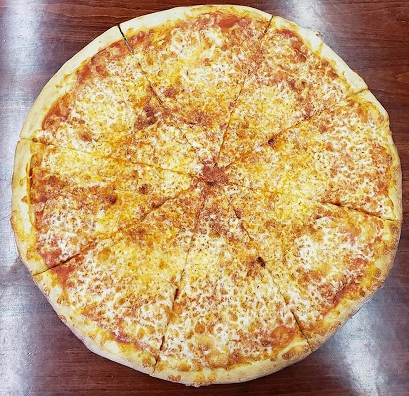 Order Cheese Pizza 14'' - Thin Crust food online from Bojono's Pizza store, Chicago on bringmethat.com