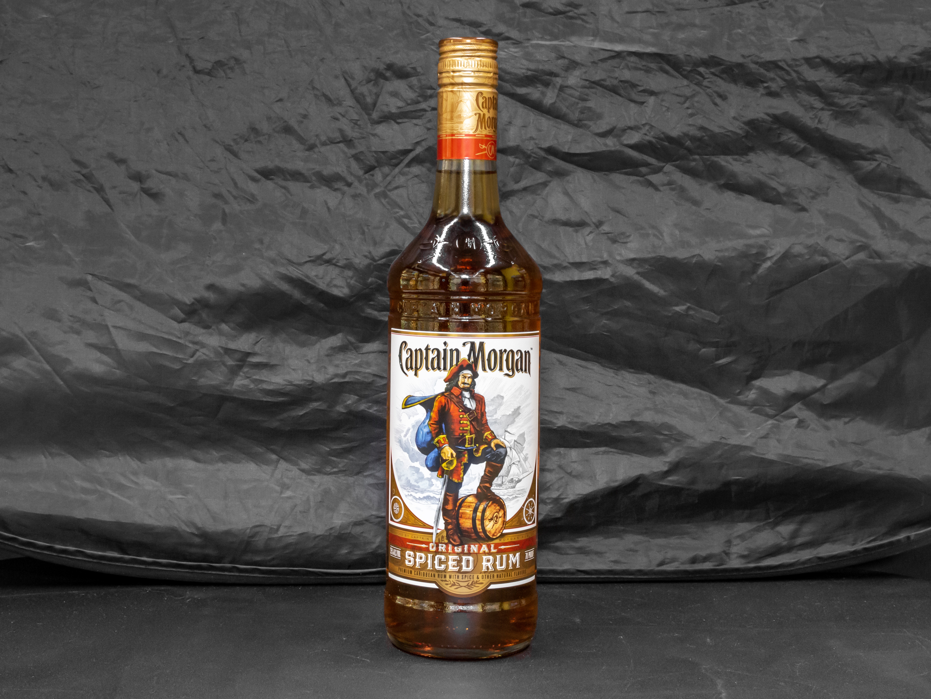 Order Captain morgan spiced 750ml Rum (35.0% ABV) food online from Gold Crown Liquors store, Chicago on bringmethat.com