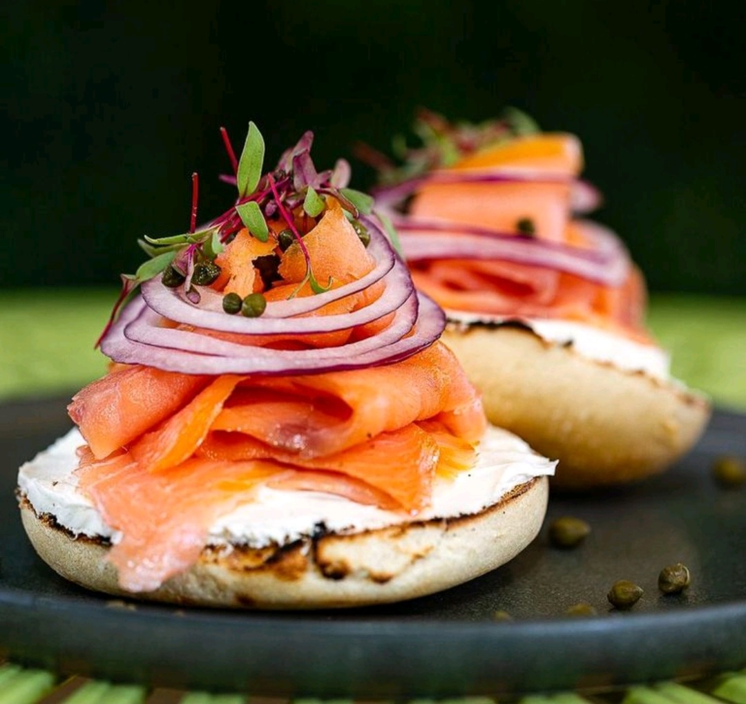 Order Bagel with Smoked Salmon, Cream Cheese, Red Onion and Capers food online from The Bee Hive Market and Deli store, Whittier on bringmethat.com