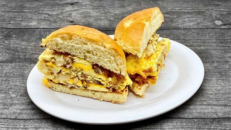 Order Latkes ‘N Eggs Breakfast Sandwich food online from Roasters n Toasters store, Miami on bringmethat.com