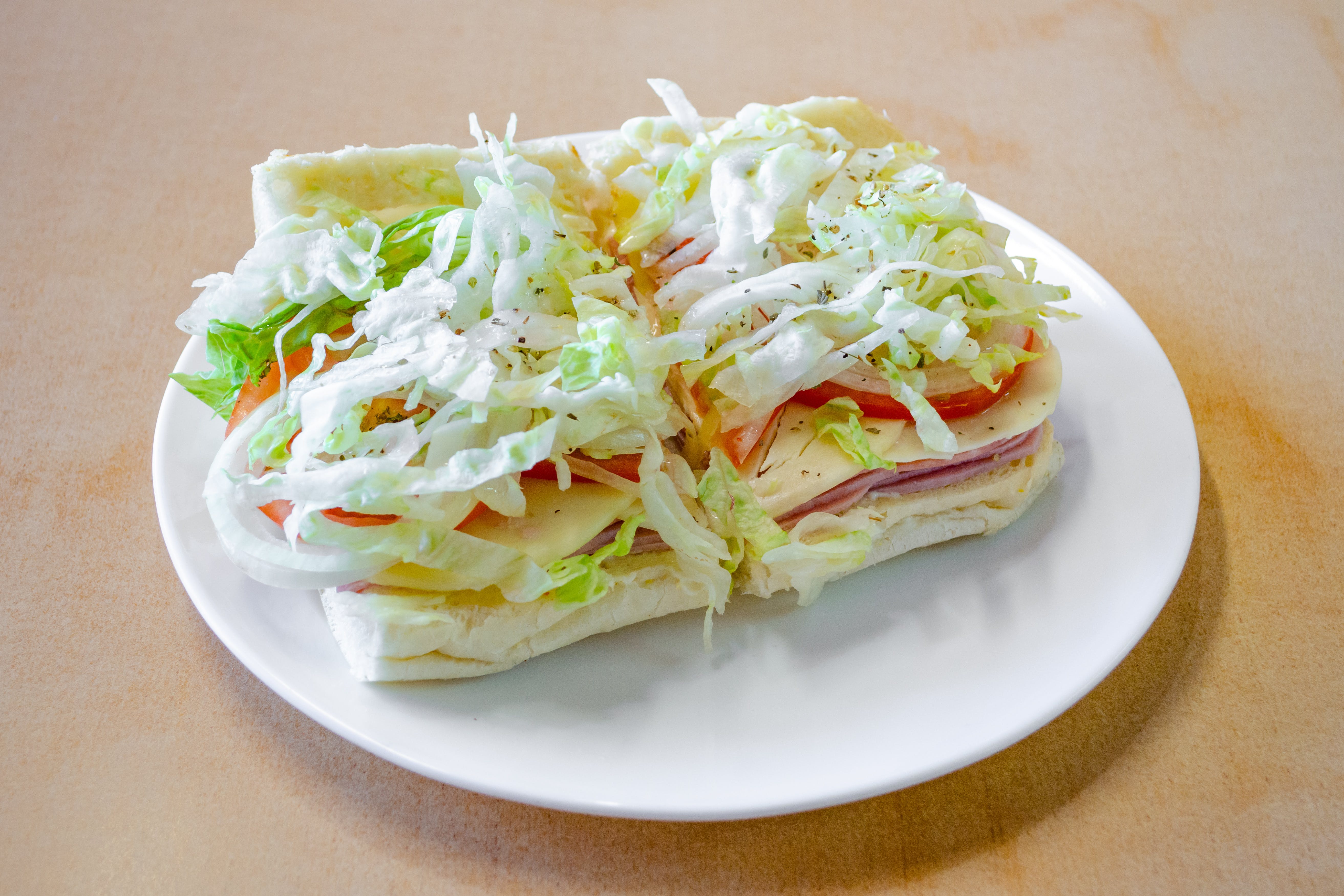 Order Ham, Salami & Cheese Sub - Small food online from Ranchito Pizzeria & Mexican Restaurant store, Fords on bringmethat.com