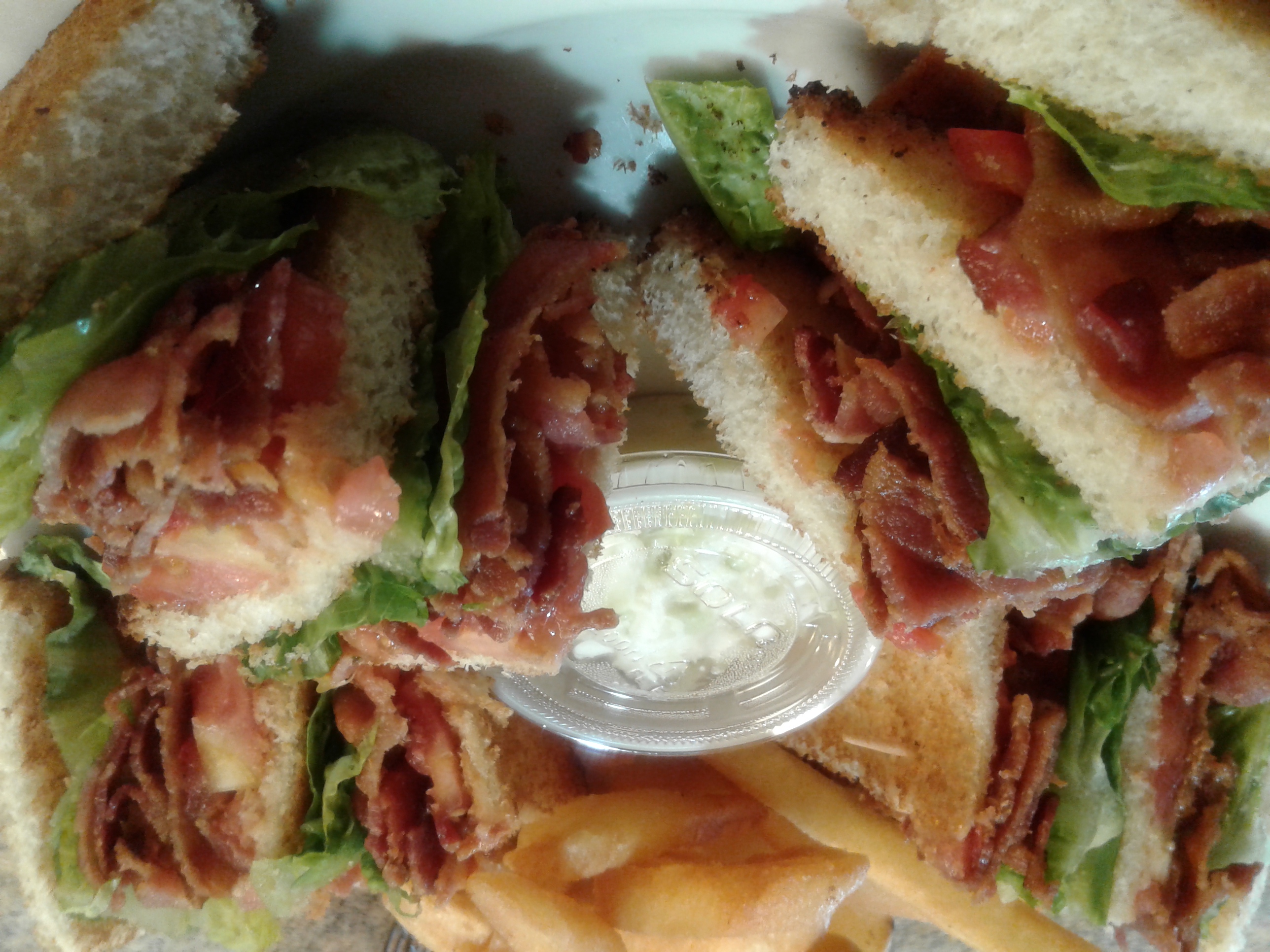 Order BLT Triple Club Sandwich food online from Wacky Zaki's store, Philadelphia on bringmethat.com