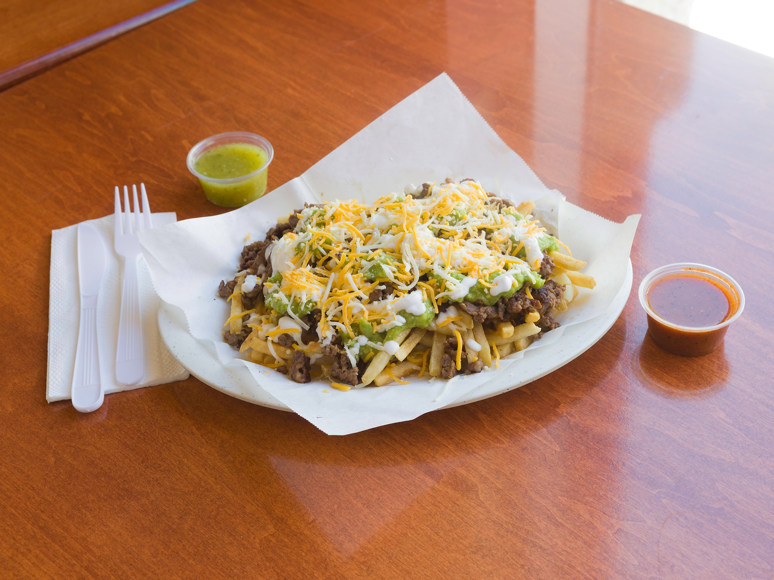 Order Carne Asada Fries food online from Tosinos Mexican Grill store, Gilbert on bringmethat.com