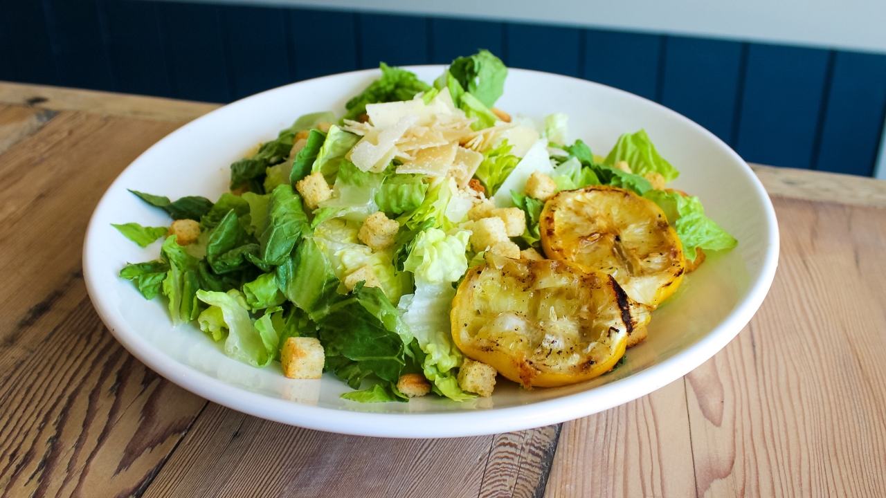 Order Lg Caesar Salad food online from Spinners store, Albany on bringmethat.com