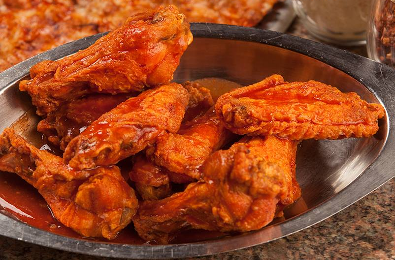 Order Wings food online from Cecil Whittaker's Pizzeria store, St. Louis on bringmethat.com