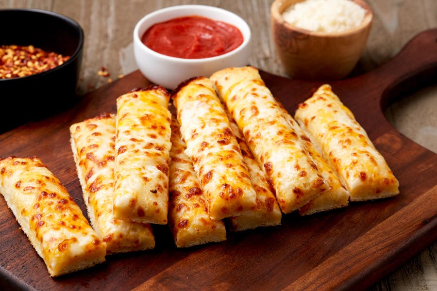 Order Garlic Breadsticks - Regular food online from Simple Simon's Pizza store, Checotah on bringmethat.com