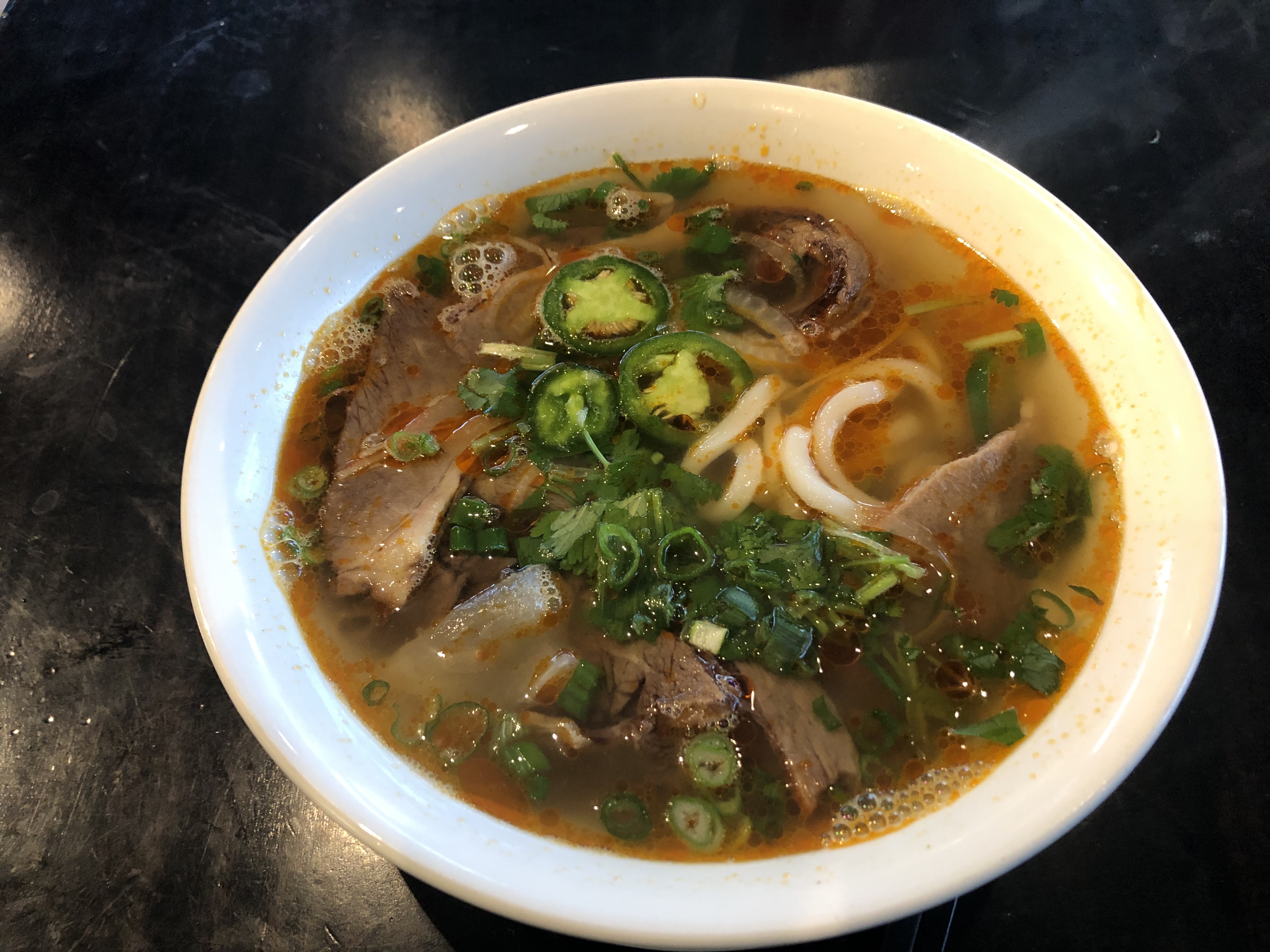 Order C11. Spicy Beef Medium Noodle- Bun Bo Hue food online from Pho Amour store, Fontana on bringmethat.com