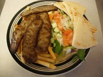 Order Gyro Plate Dinner food online from Original Tommy Burgers store, Wilmington on bringmethat.com