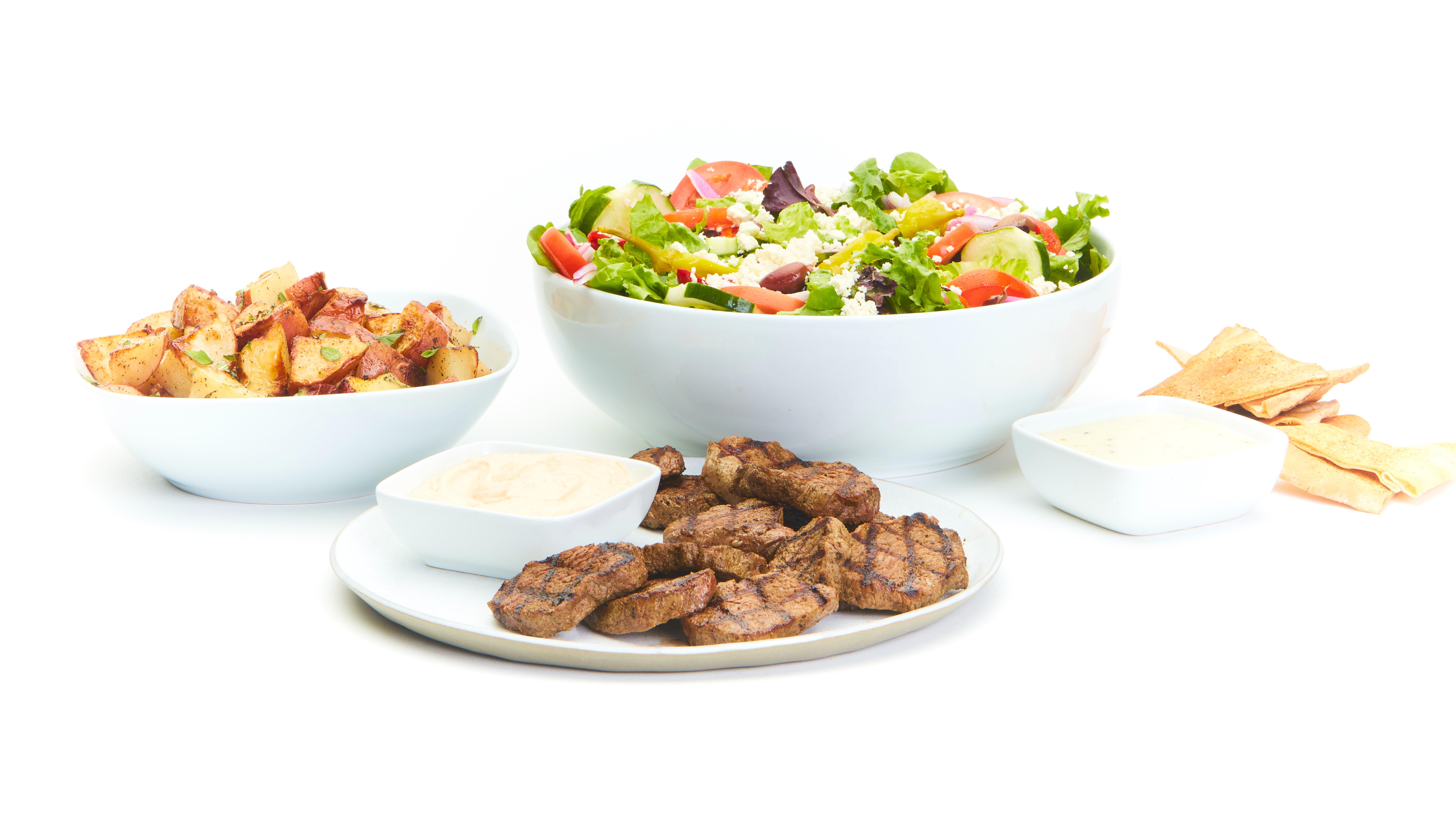 Order Grilled Beef Feast for 4 food online from Tazikis Mediterranean Cafe store, Denver on bringmethat.com