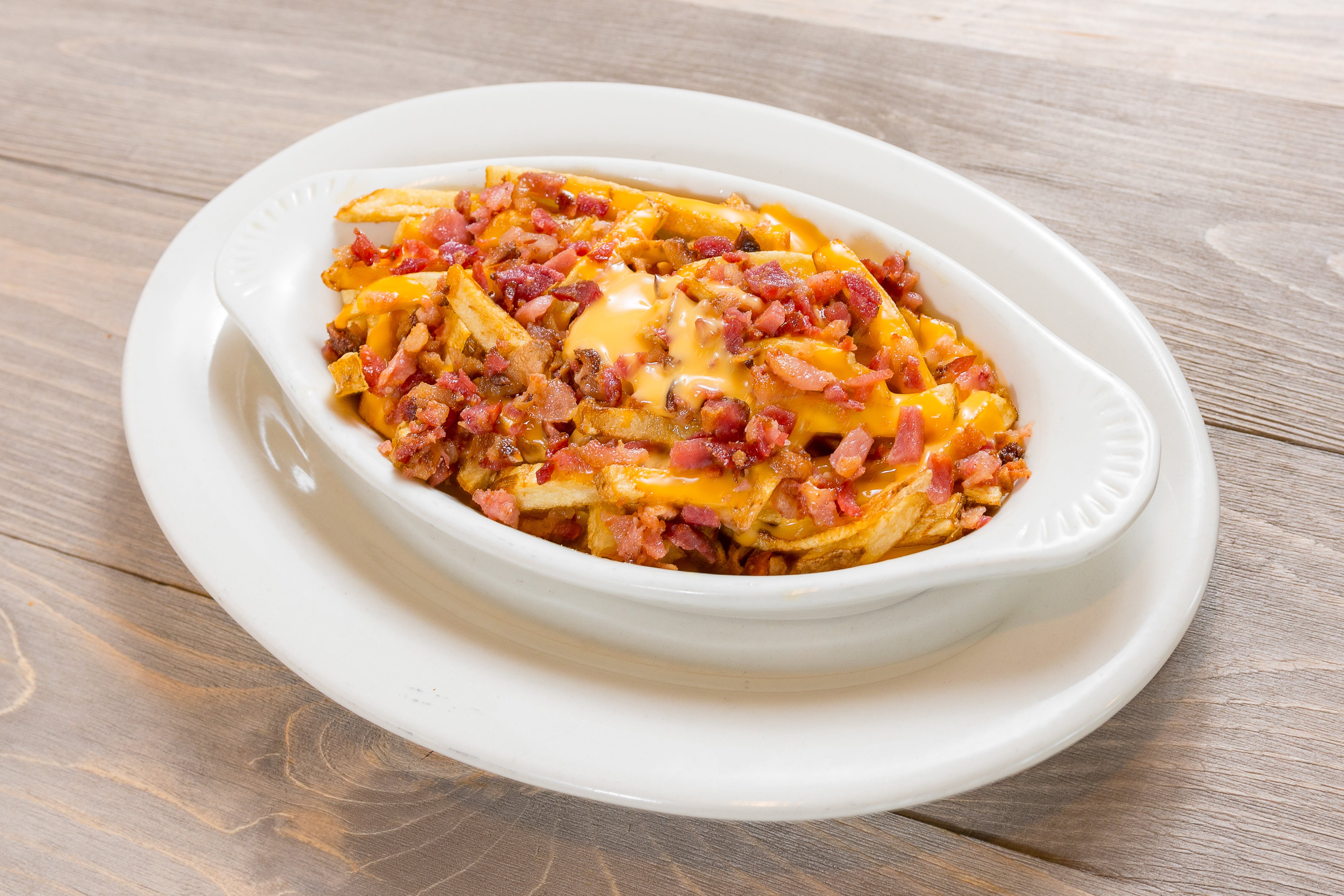 Order Bacon Cheese Fries - Appetizer food online from Carlo's Italian Restaurant store, Reading on bringmethat.com