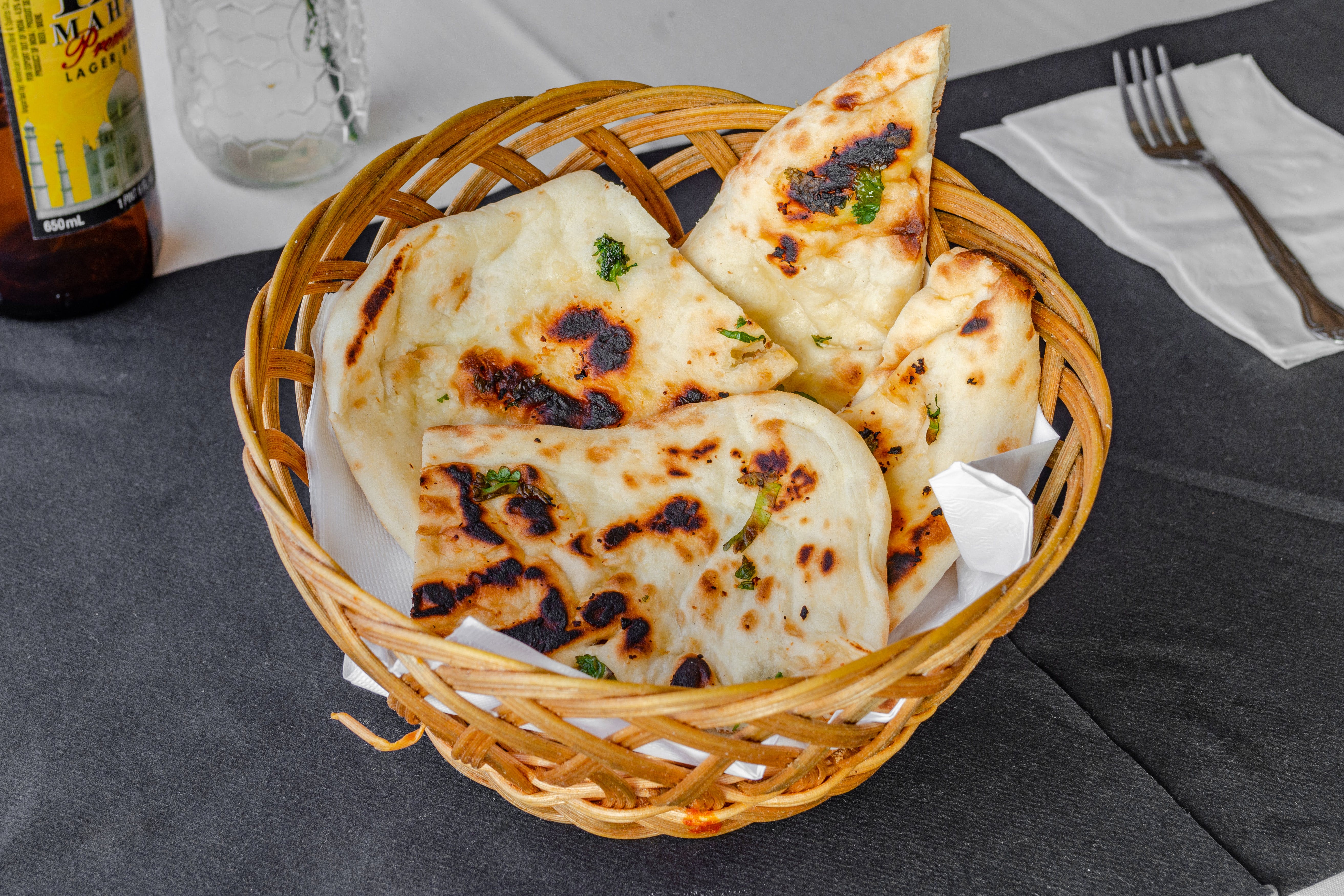 Order Garlic Naan  food online from i2i Indian Italian Fusion store, Boonton on bringmethat.com
