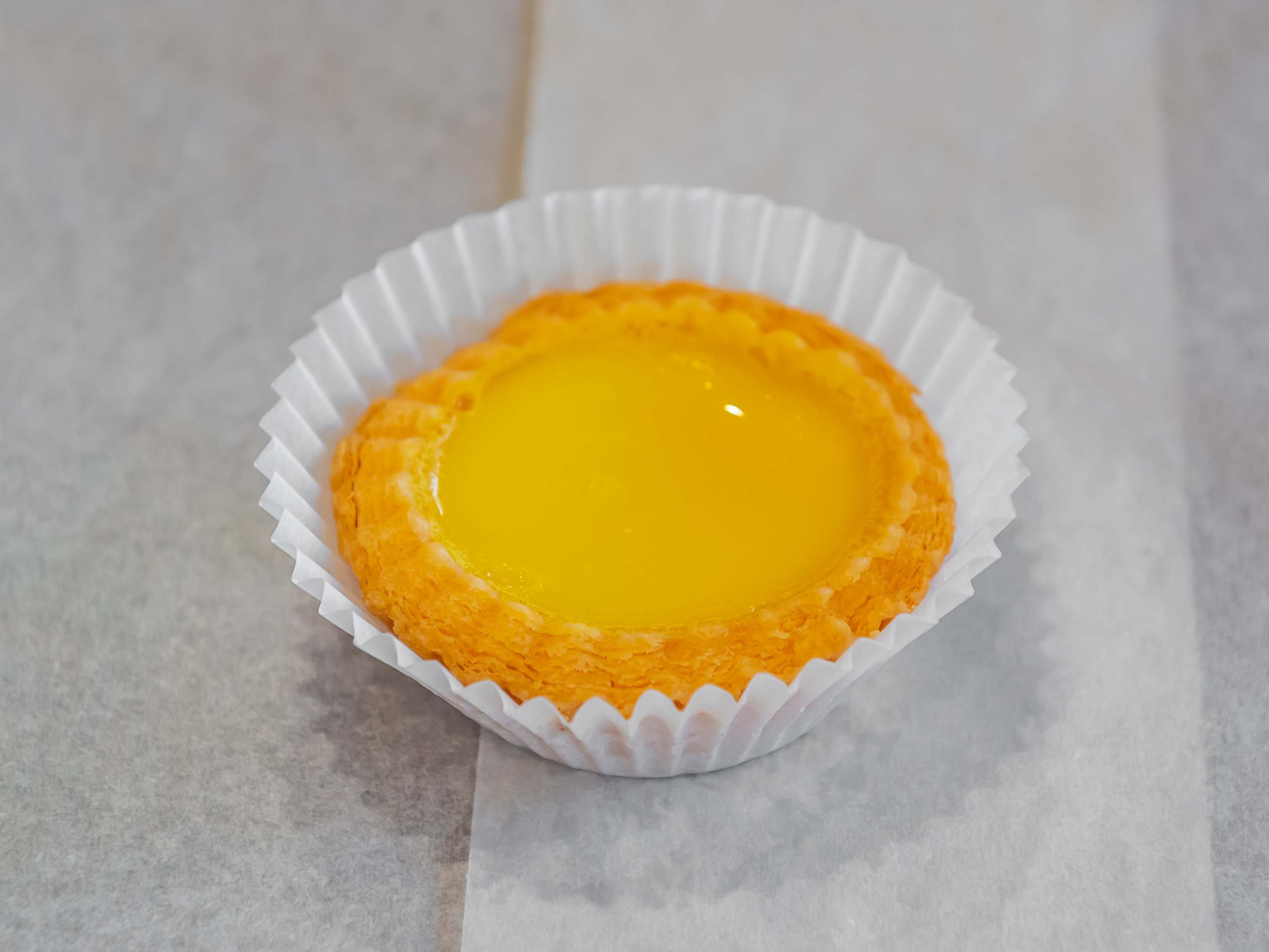 Order Custard Egg Tart (蛋撻) food online from Long Family Pastry store, Los Angeles on bringmethat.com