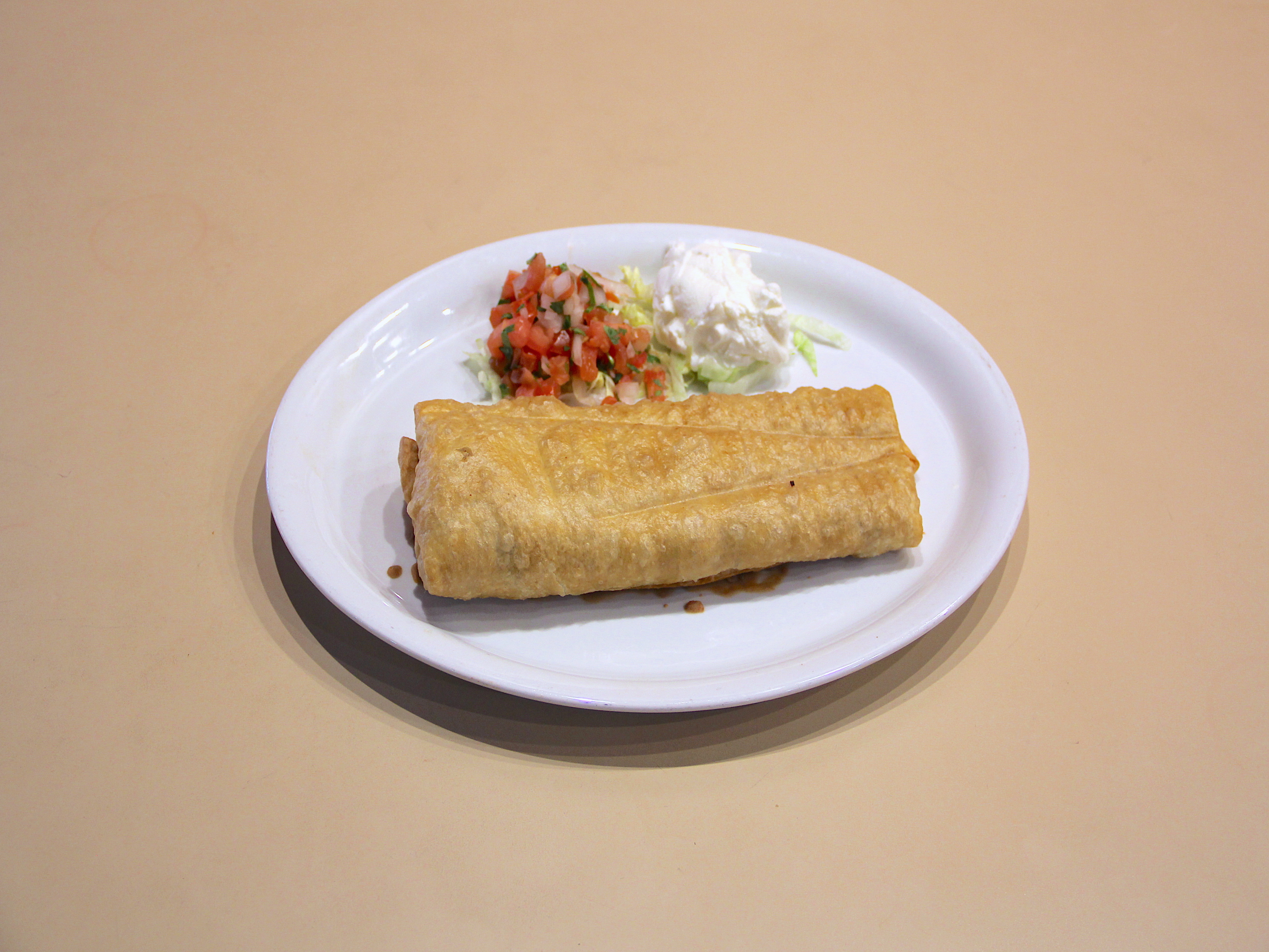 Order Chimichanga Burrito food online from Xavi Cantina & Grill store, Chino Hills on bringmethat.com