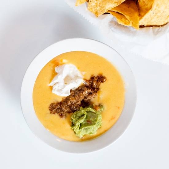 Order Chili con Queso Half Pint food online from El Fenix store, Irving on bringmethat.com