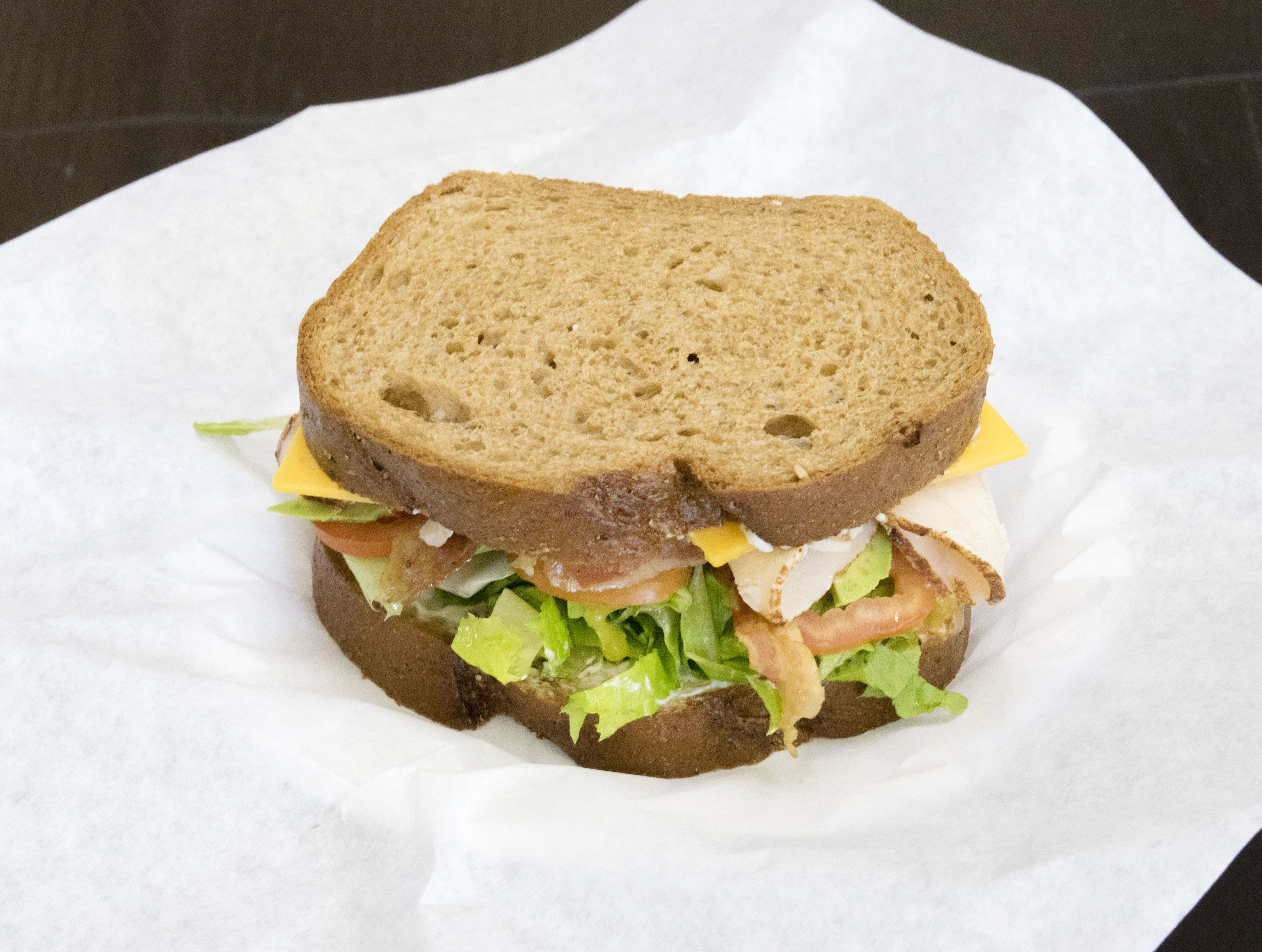 Order 12" California Club Sandwich food online from Knockout Deli store, San Diego on bringmethat.com