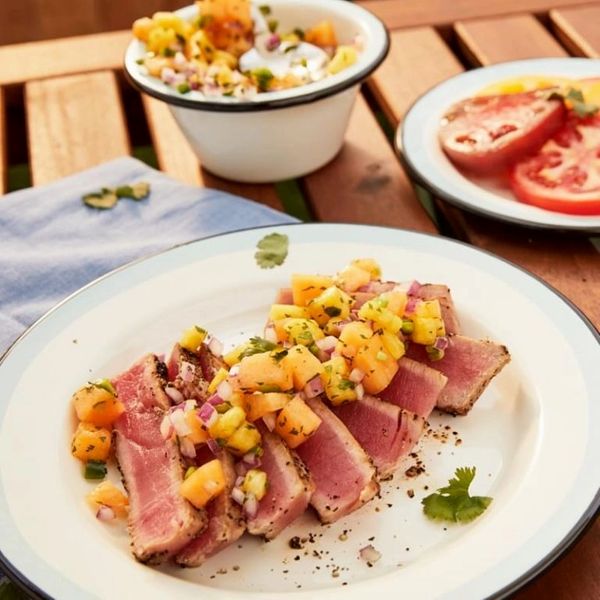 Order Grilled Ahi Tuna Steak with Jalapeno Pineapple and Cantaloupe Salsa  food online from The Spice Of Life Catering store, Carrollton on bringmethat.com