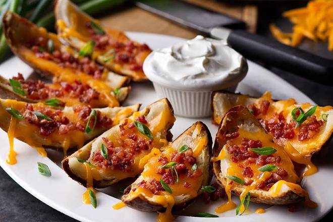 Order Made-From-Scratch Loaded Potato Skins food online from Logan'S Roadhouse 506 store, Ruston on bringmethat.com