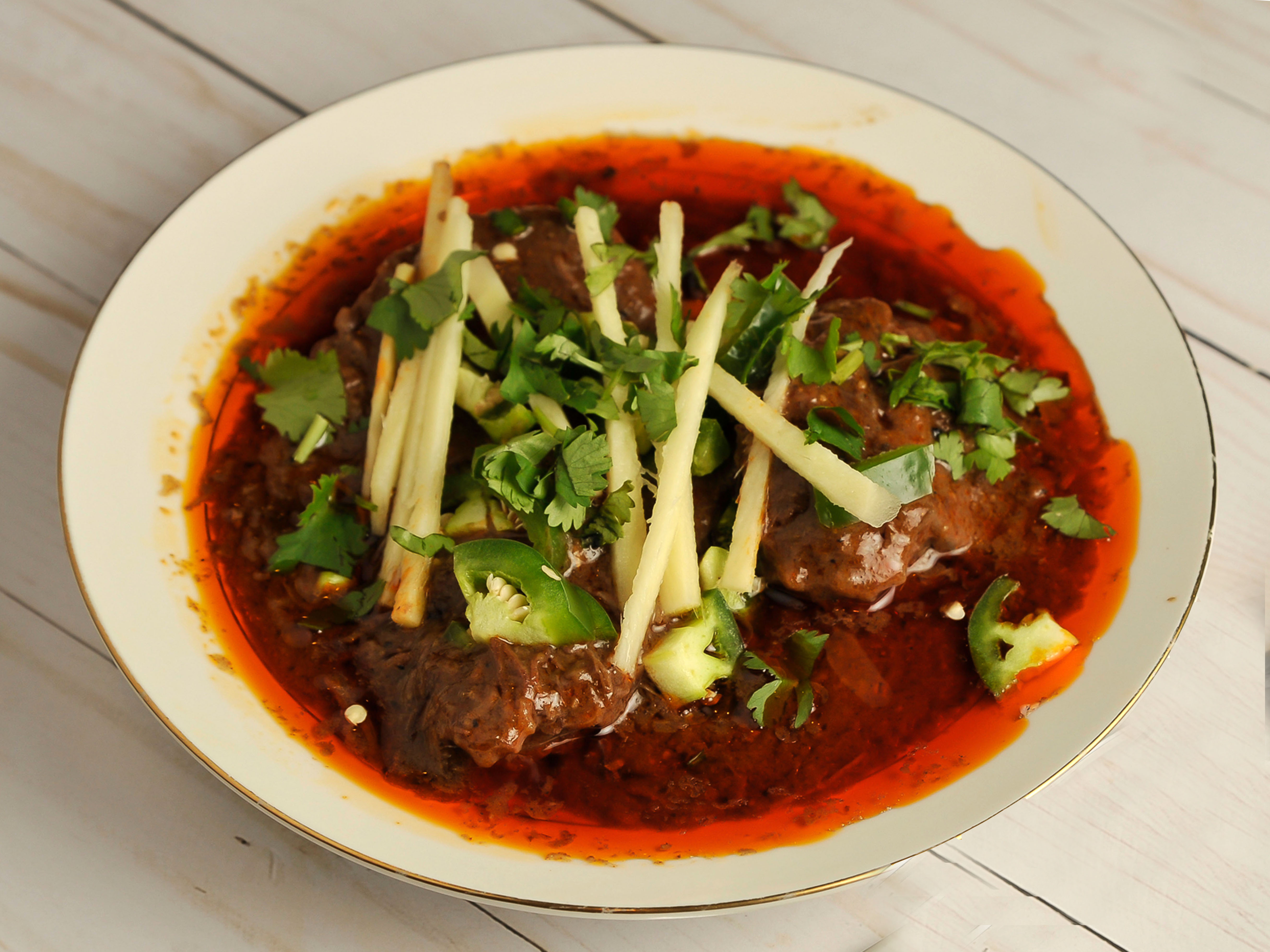 Order Beef Nehari food online from Tandoor Restaurant store, Marietta on bringmethat.com