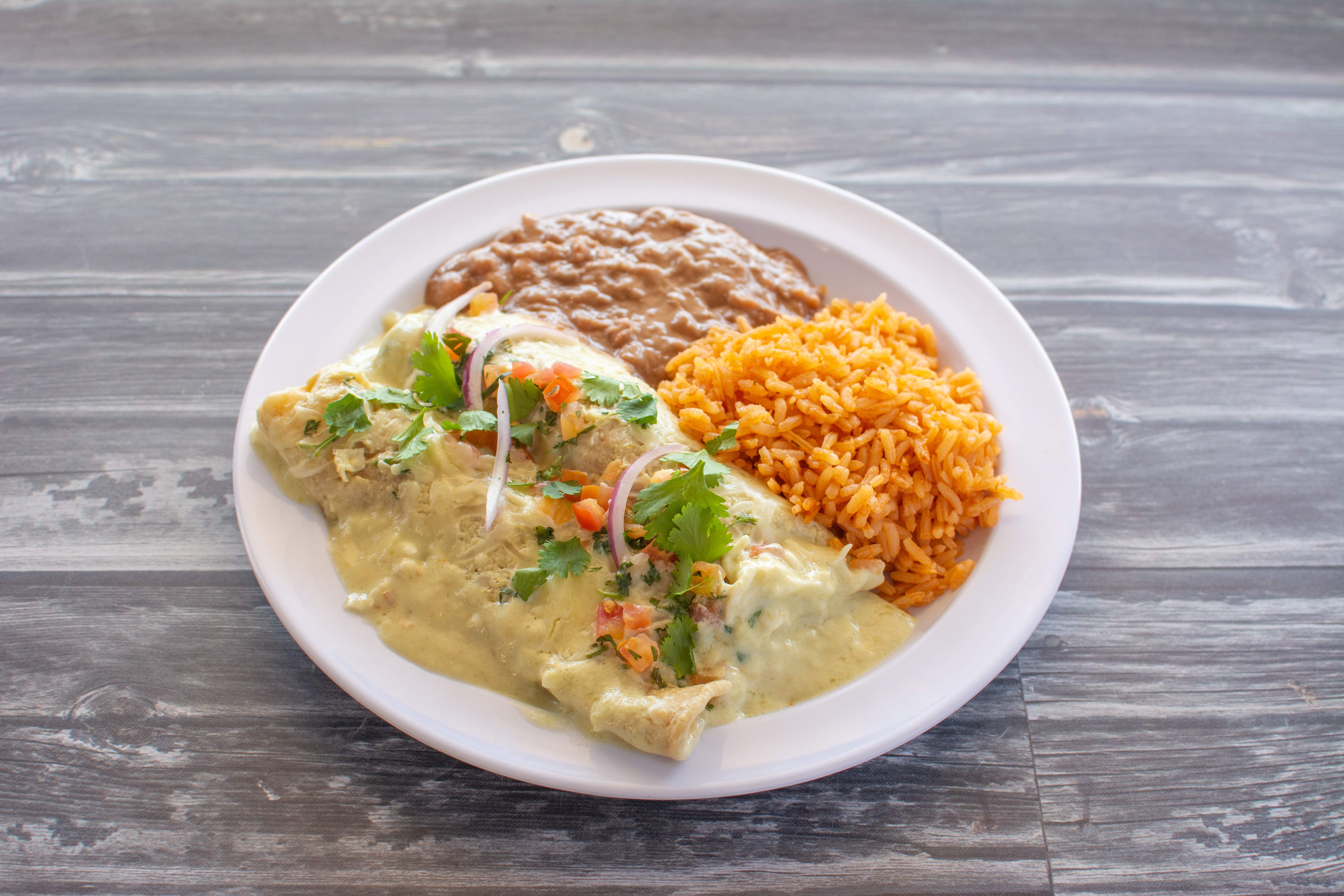 Order Enchiladas Suizas food online from Los Compadres Taqueria store, Long Beach on bringmethat.com