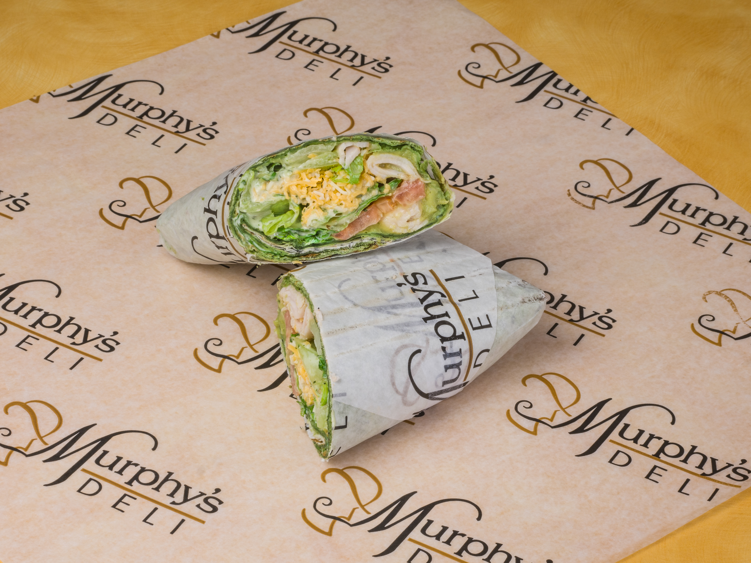 Order Turkey Avocado Wrap food online from Murphy's Deli store, The Woodlands on bringmethat.com