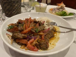 Order Traditional Saltado with a choice of Meat, Chicken, Fish or Shrimp food online from Inti store, Manhattan on bringmethat.com