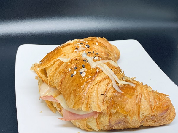 Order Ham & Cheese Croissant food online from Republik Coffee Lounge store, Pasadena on bringmethat.com