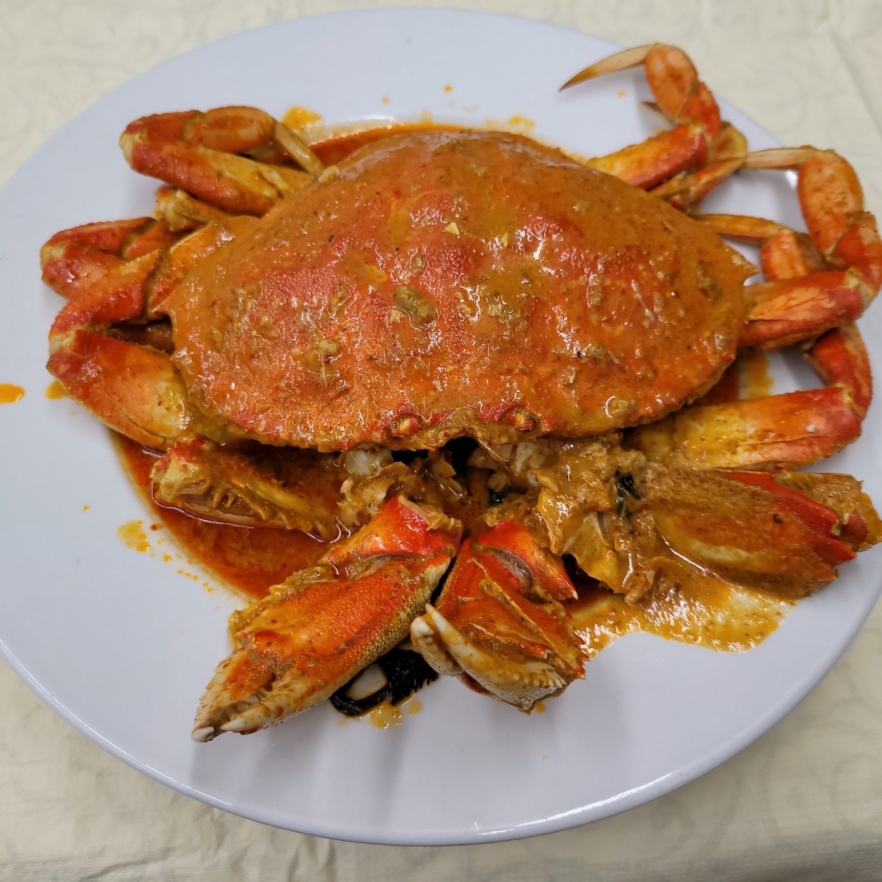 Order Curry Crab food online from PPQ Dungeness Island store, San Francisco on bringmethat.com