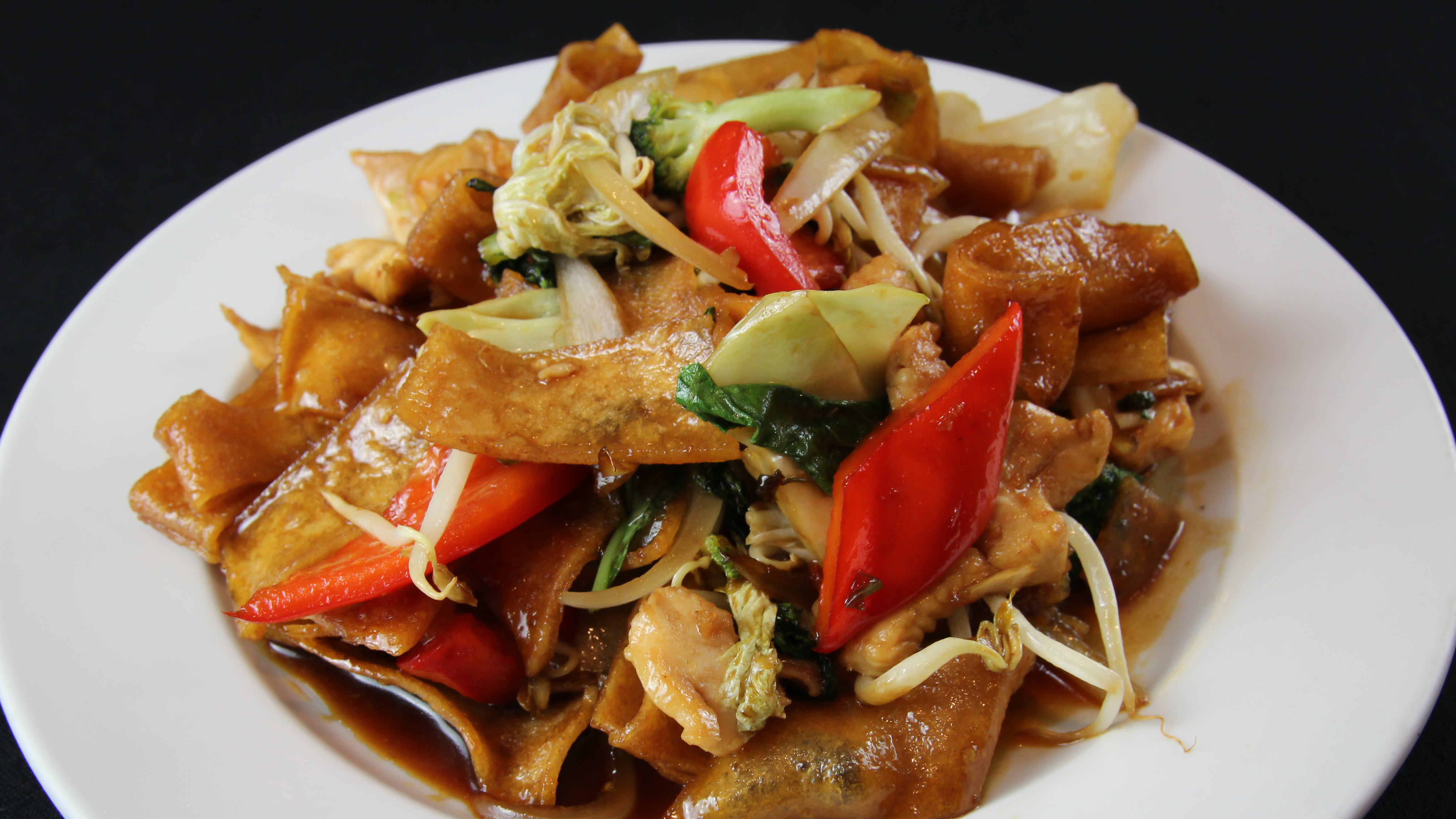 Order Kee Mow food online from Basil Thai Cafe store, Columbus on bringmethat.com