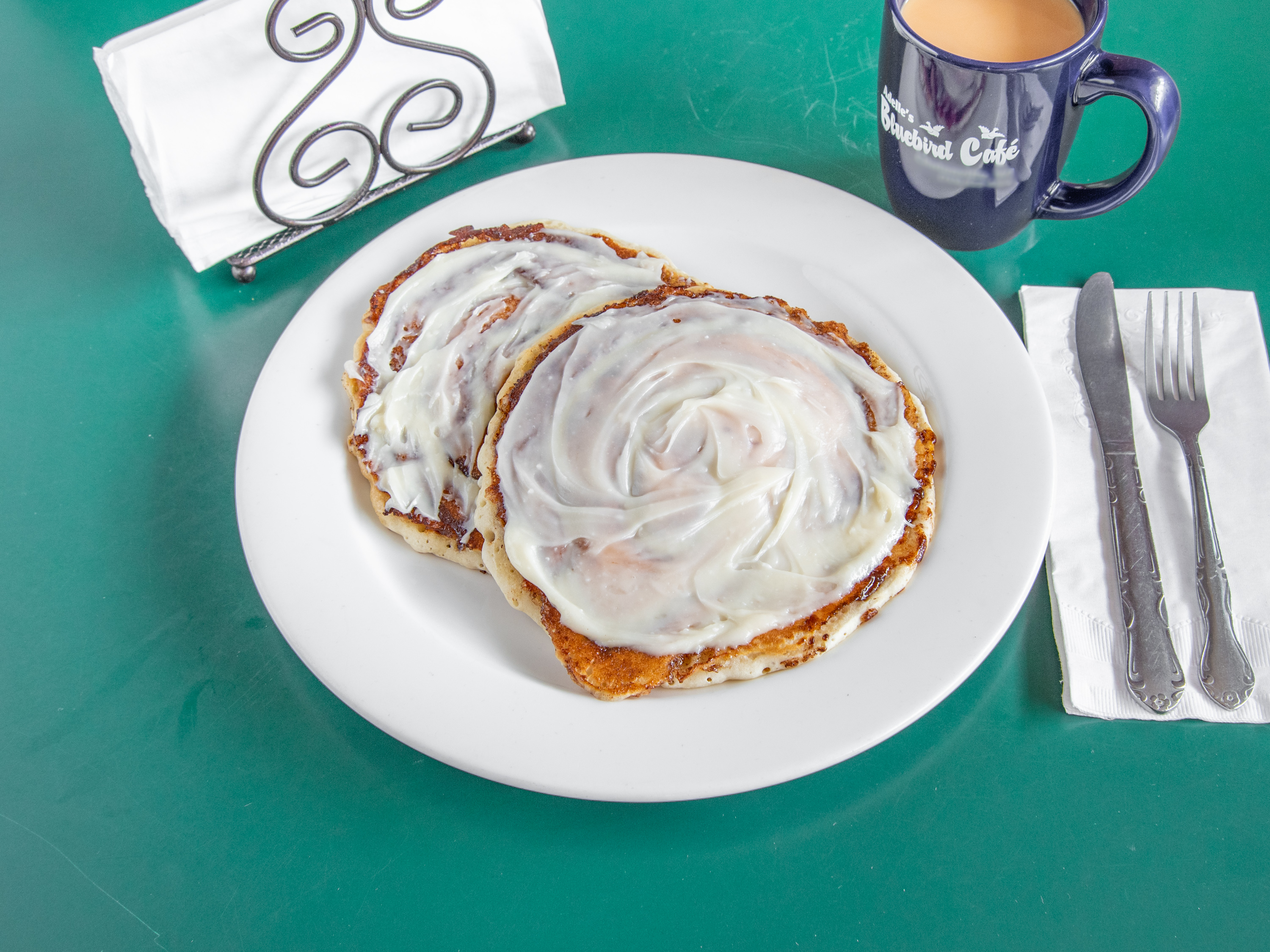 Order Cinnamon Roll Pancake food online from Adelle Bluebird Cafe store, Clintonville on bringmethat.com
