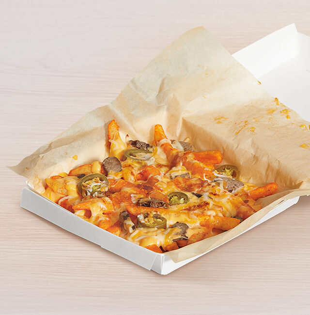 Order Grilled Cheese Nacho Fries - Steak (Spicy) food online from Taco Bell store, Rancho Cordova on bringmethat.com