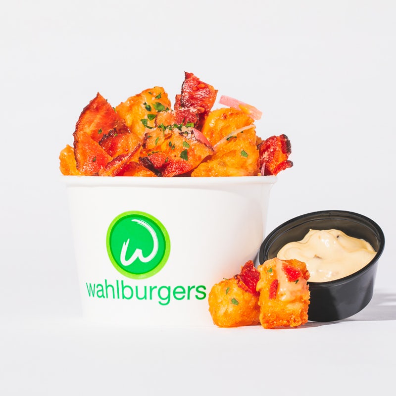 Order SPICY CHEESE & BACON TOTS food online from Wahlburgers store, Pittsburgh on bringmethat.com