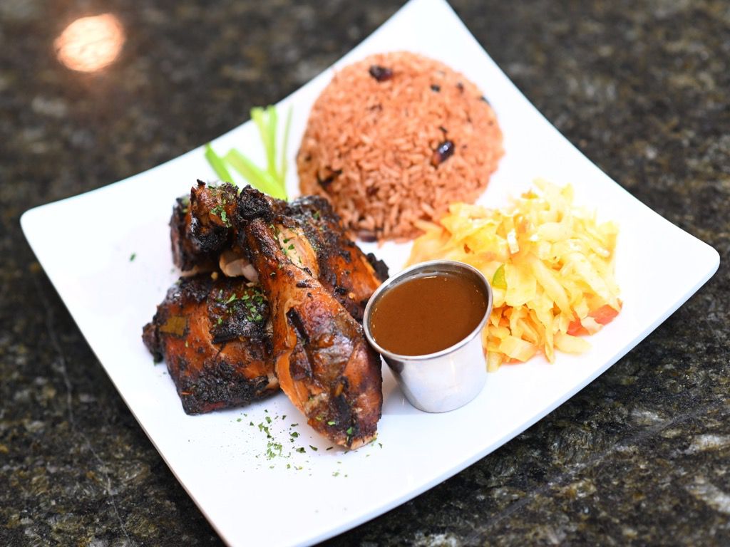 Order Jerk Chicken food online from Cafe 214 store, Addison on bringmethat.com
