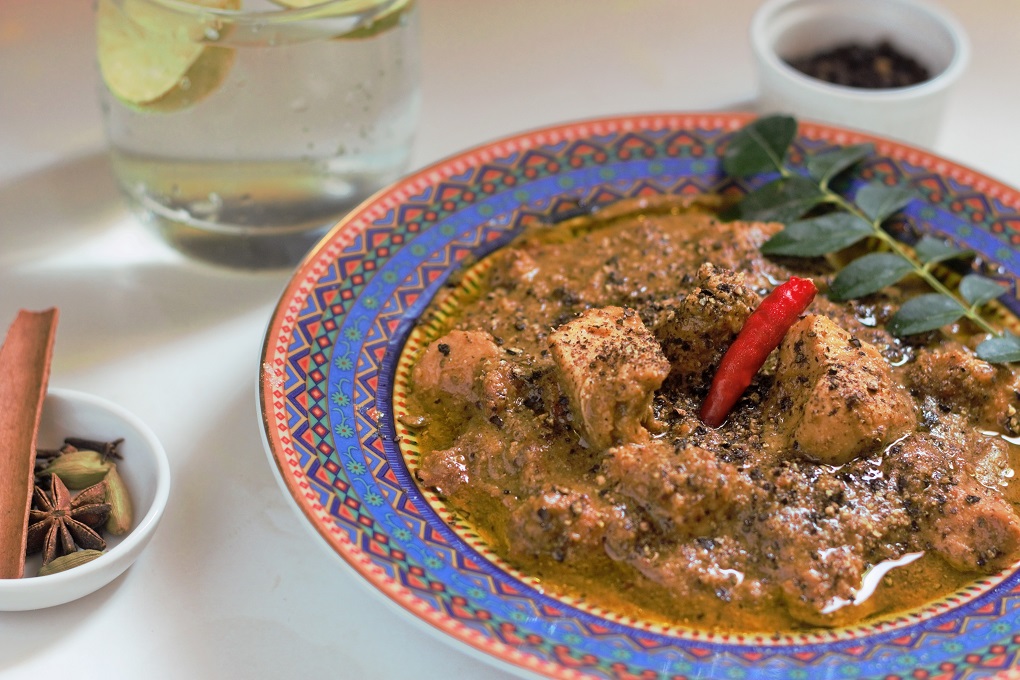 Order Pepper Chicken Curry food online from Madras Cafe store, San Diego on bringmethat.com