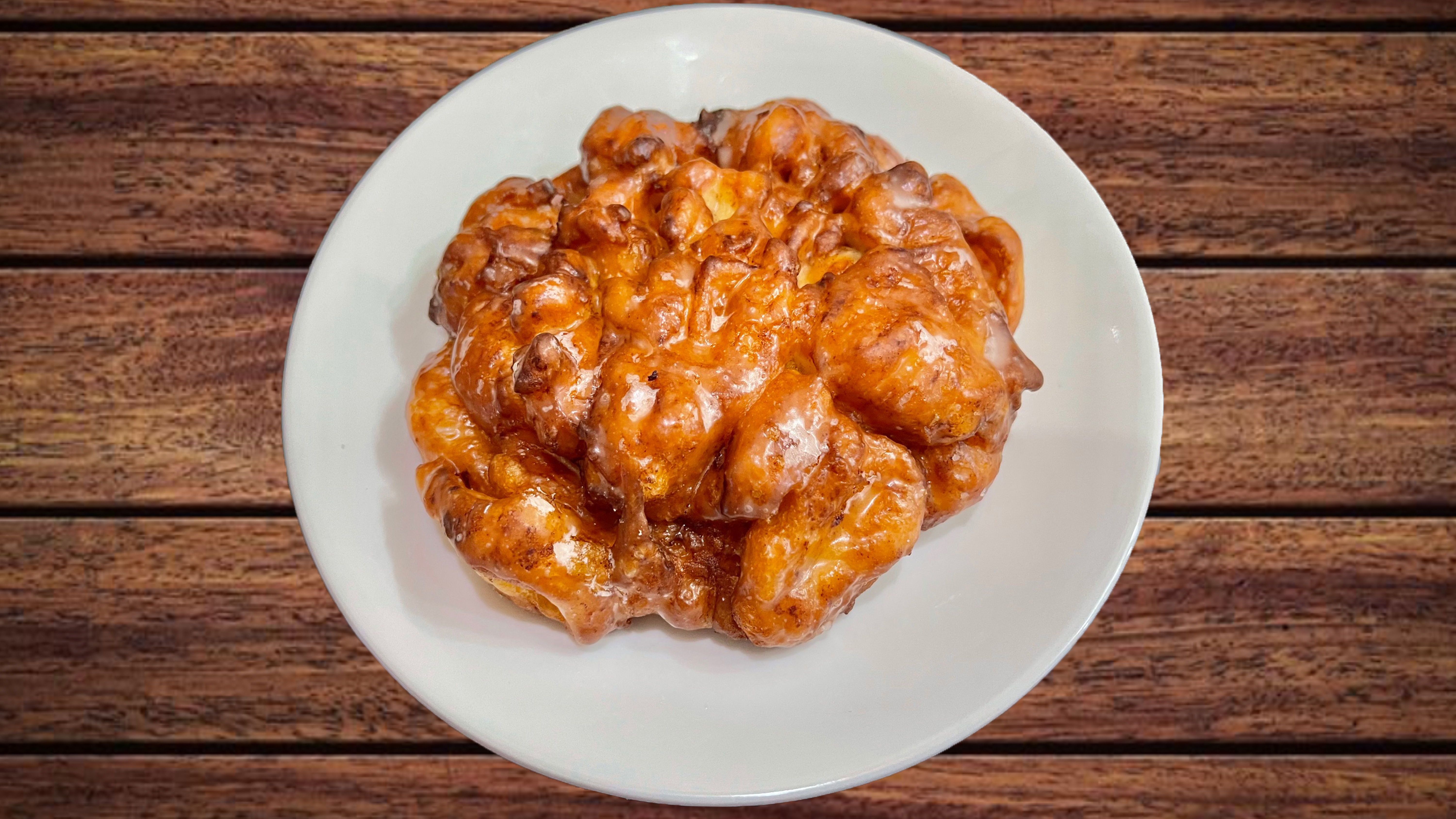 Order Apple Fritter food online from Glaze Donuts And Bagel Sandwiches store, San Francisco on bringmethat.com
