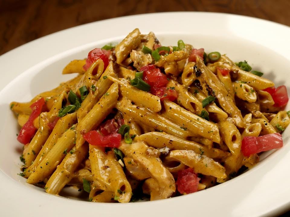Order Penne Vodka Dinner - Pasta food online from Orfino's Restaurant store, Briarcliff Manor on bringmethat.com