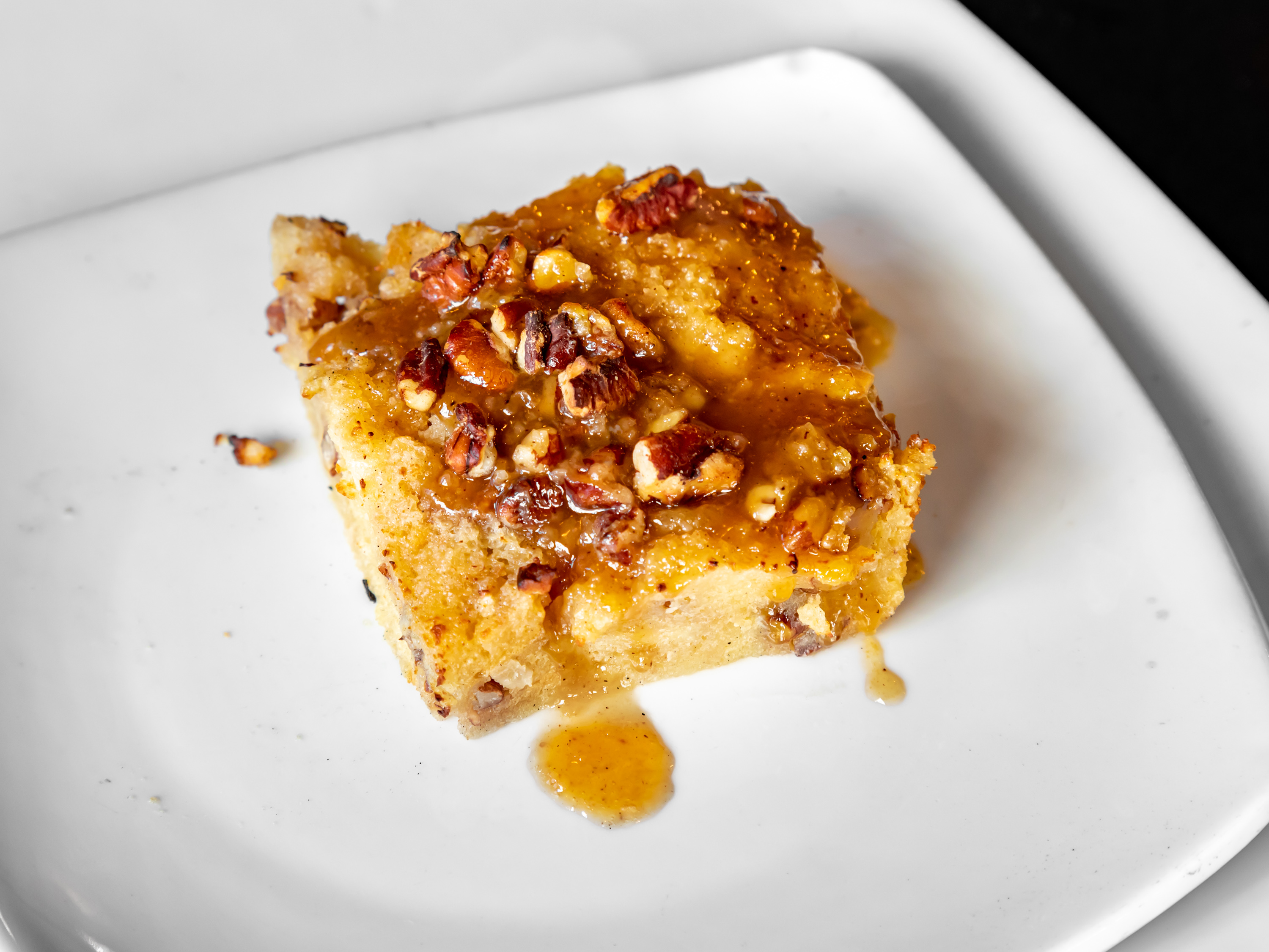Order Grand Marnier Bread Pudding food online from The Block Bistro And Grill store, Indianapolis on bringmethat.com