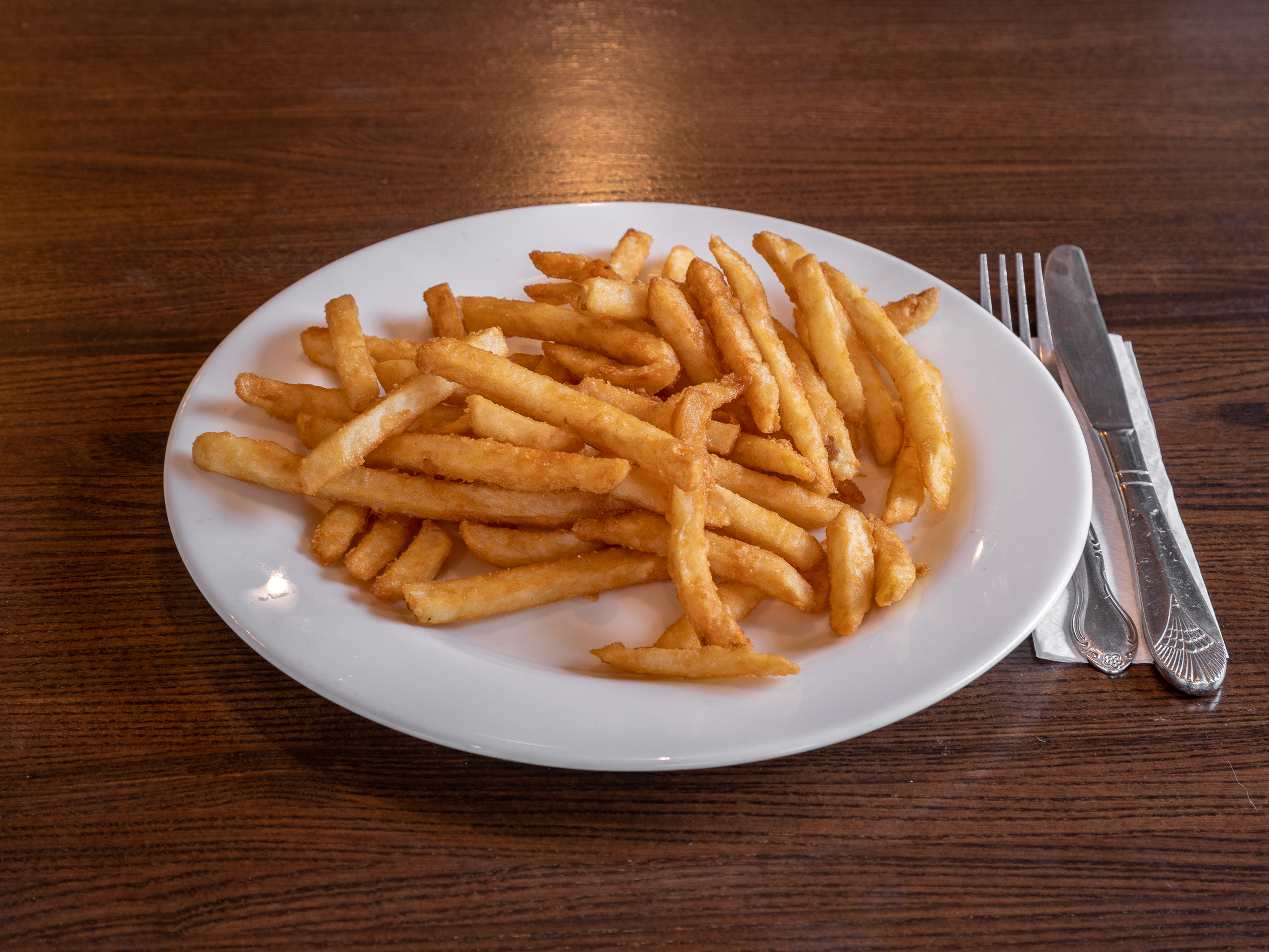 Order Fries food online from Nino's Pizza & Restaurant store, Hillsdale on bringmethat.com