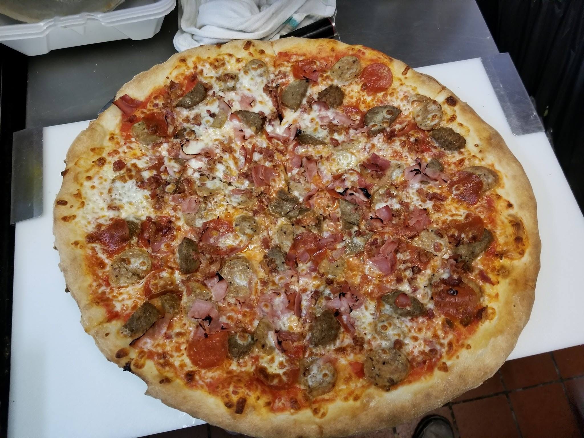 Order The Meat Lovers Pizza - Small 12'' (6 Slices) food online from Mingaliens Trattoria store, Natick on bringmethat.com