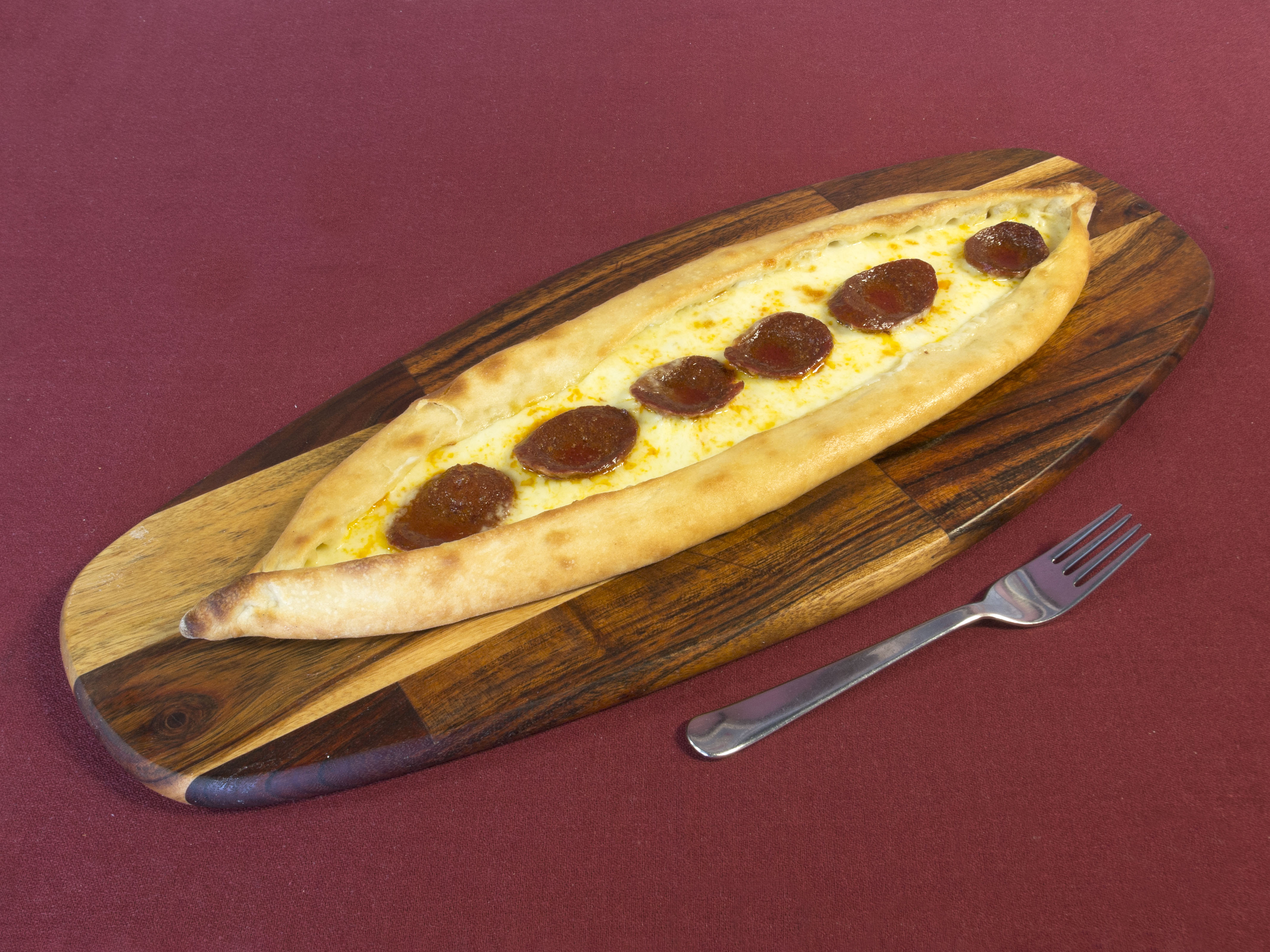Order Sucuklu Pide food online from Lezzet Cafe store, Dallas on bringmethat.com