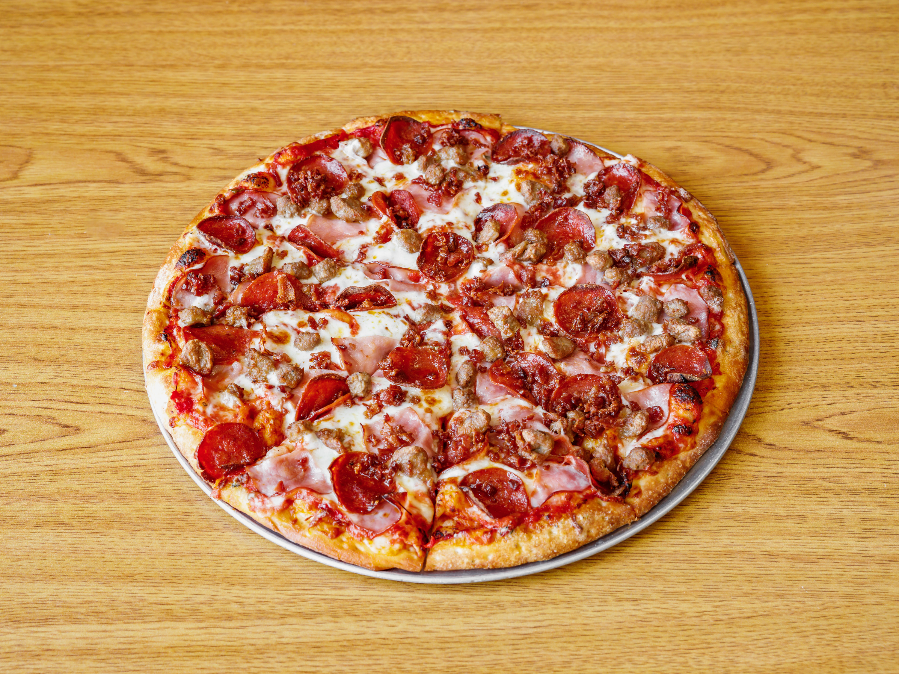 Order All Meat Combo Pizza food online from Combo's Pizza store, Fullerton on bringmethat.com