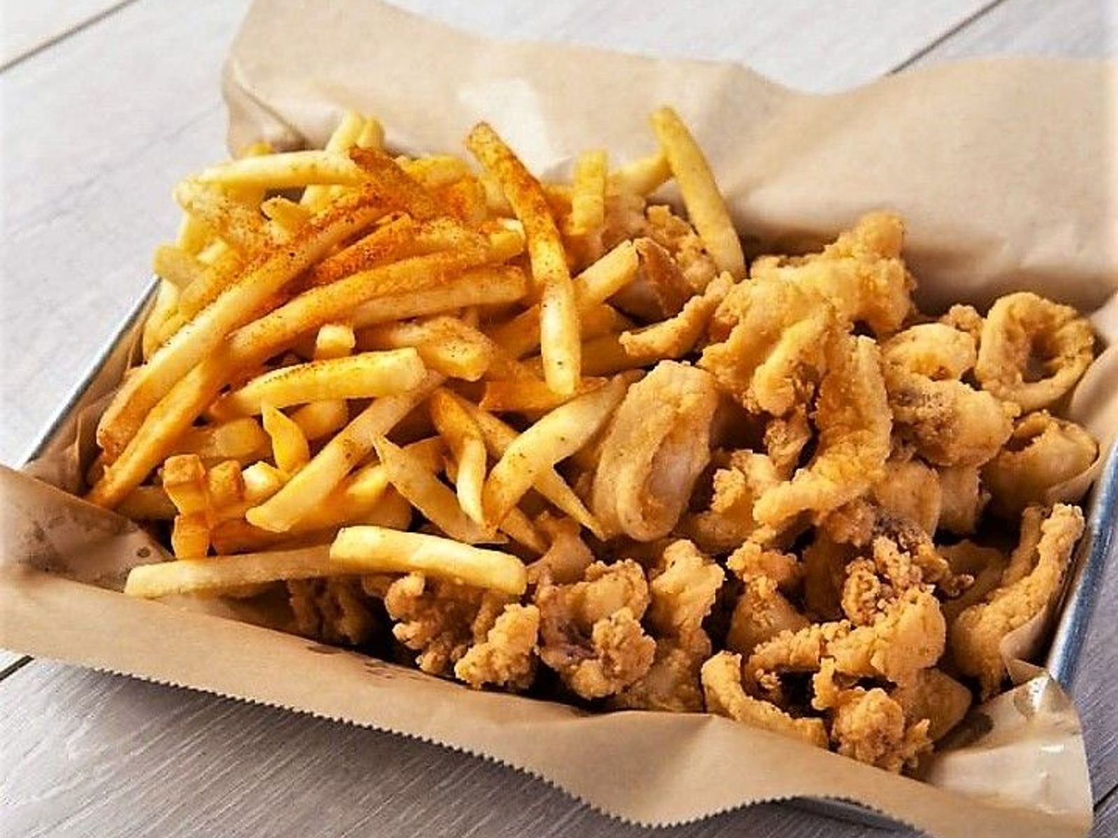 Order F8. Fried Calamari Basket(15) food online from Juicy Seafood store, Clarksville on bringmethat.com