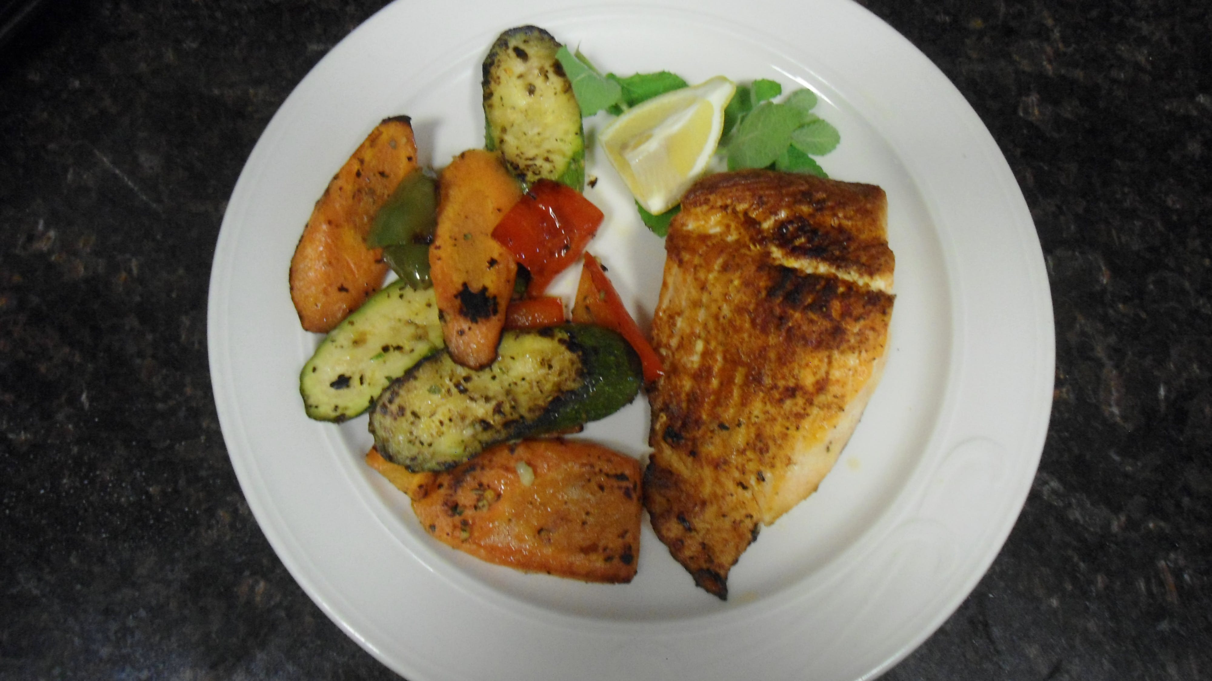 Order Grilled Salmon over Veggies - Entree food online from Sapore Woodfire Pizza & Restaurant store, Ventnor City on bringmethat.com